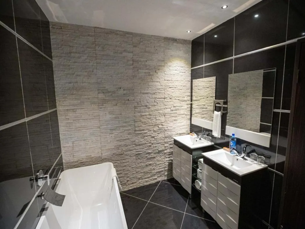 Bathroom in Tripod By Pedestal Hotel