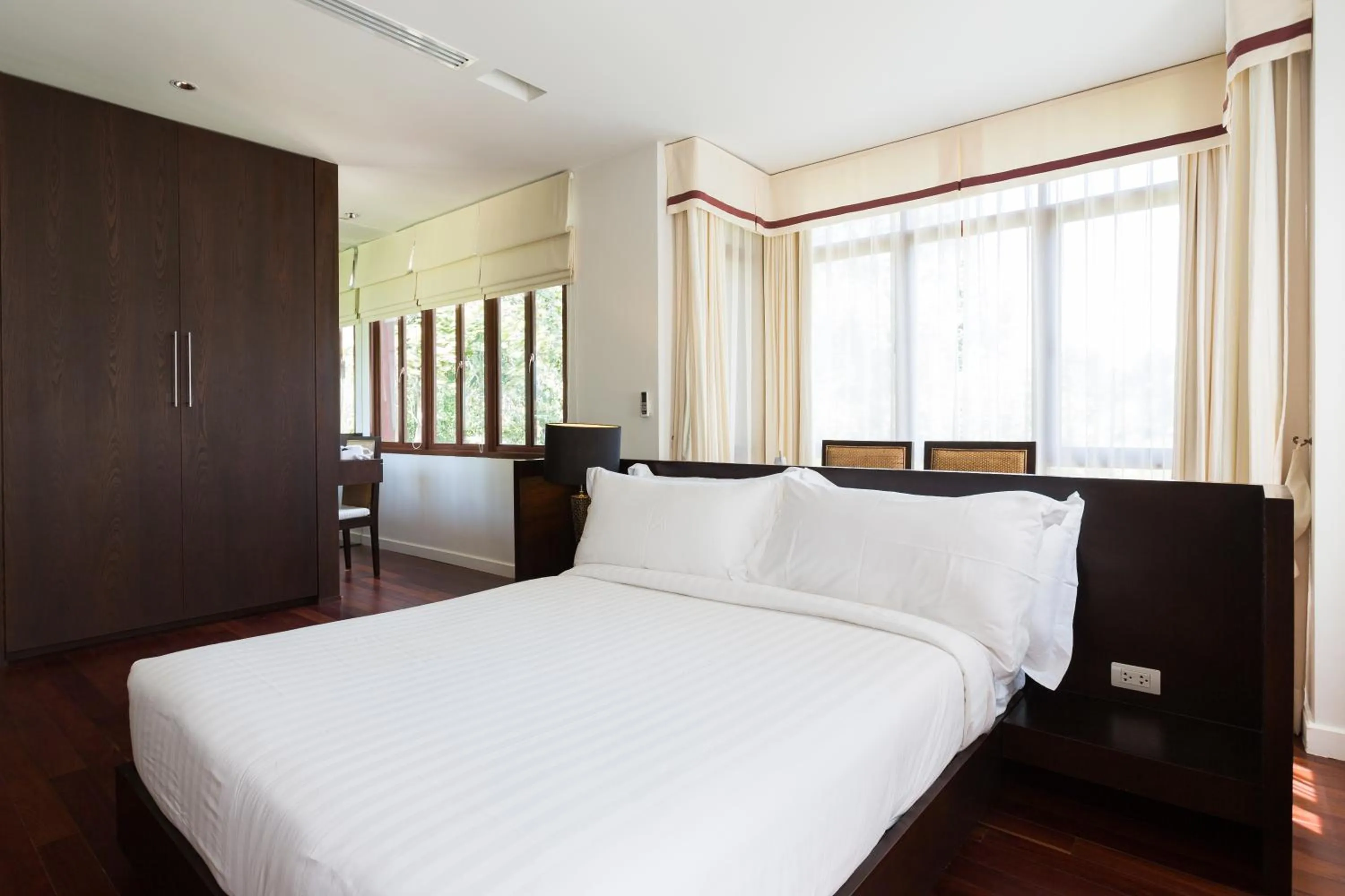 Bed in Amatapura Beachfront Villa 15, SHA Certified