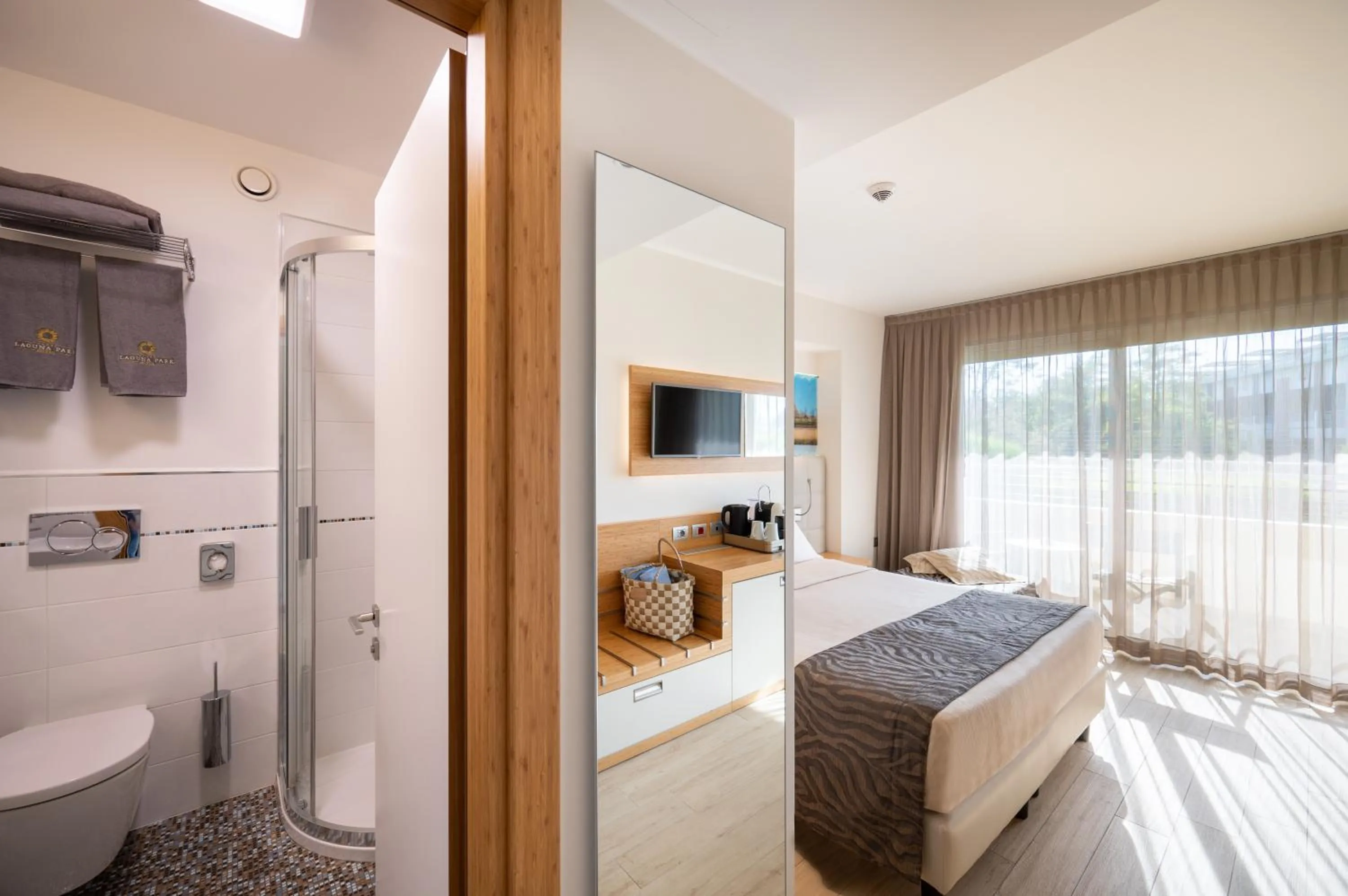 Bed in Laguna Park Hotel 4Superior