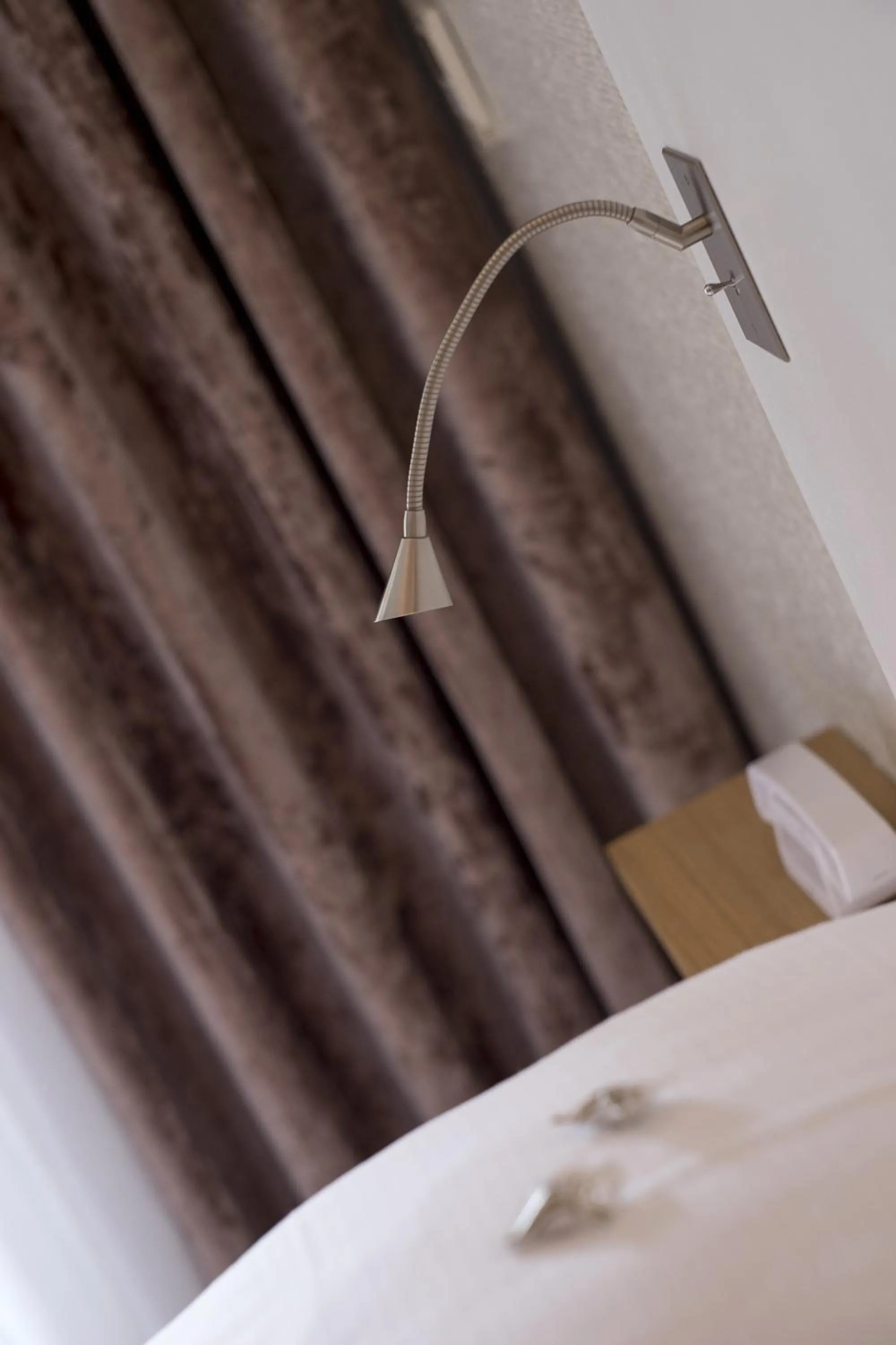 Decorative detail, Bed in Hotel des Lices