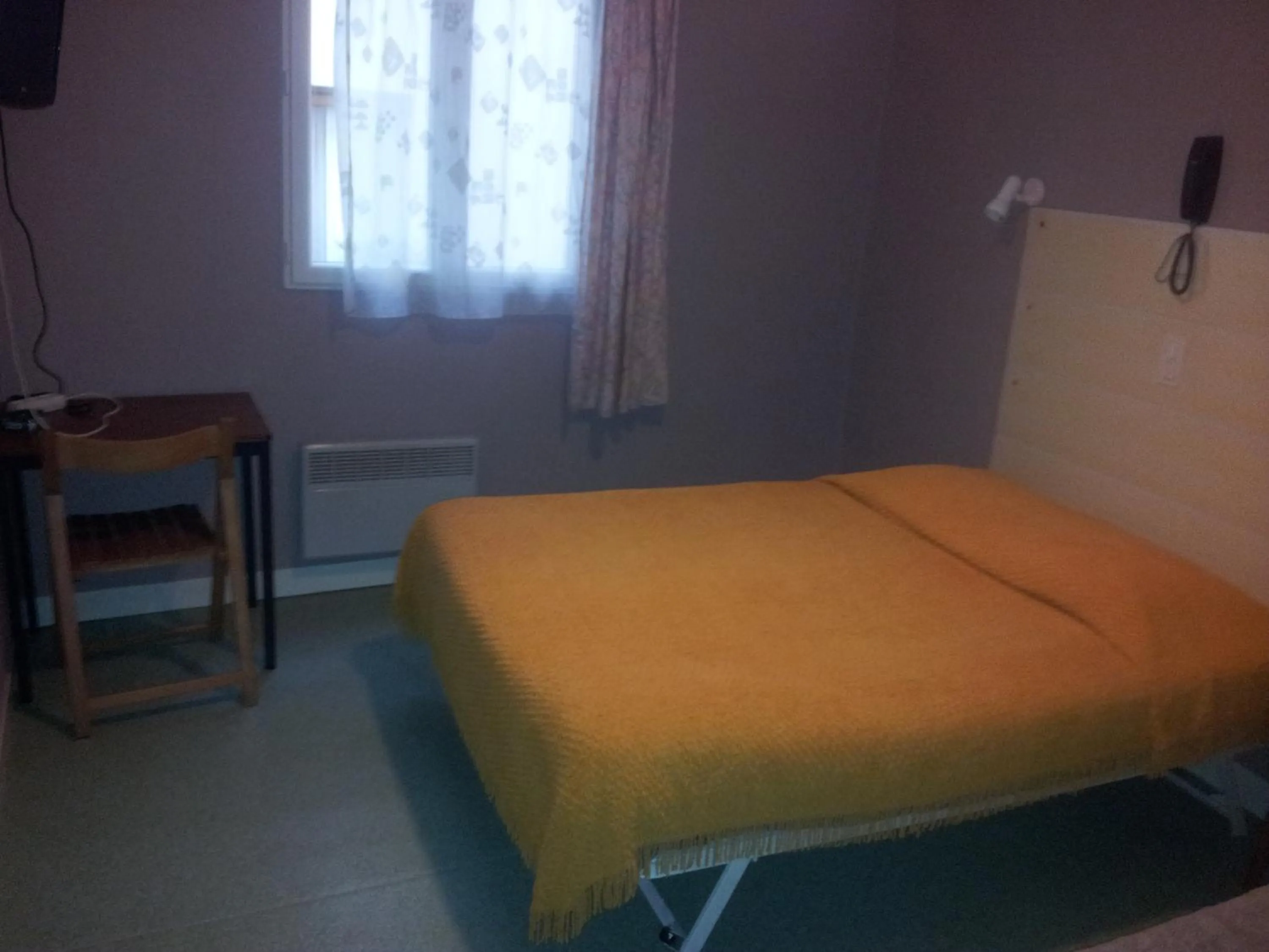 Bedroom in Hôtel du Terrage