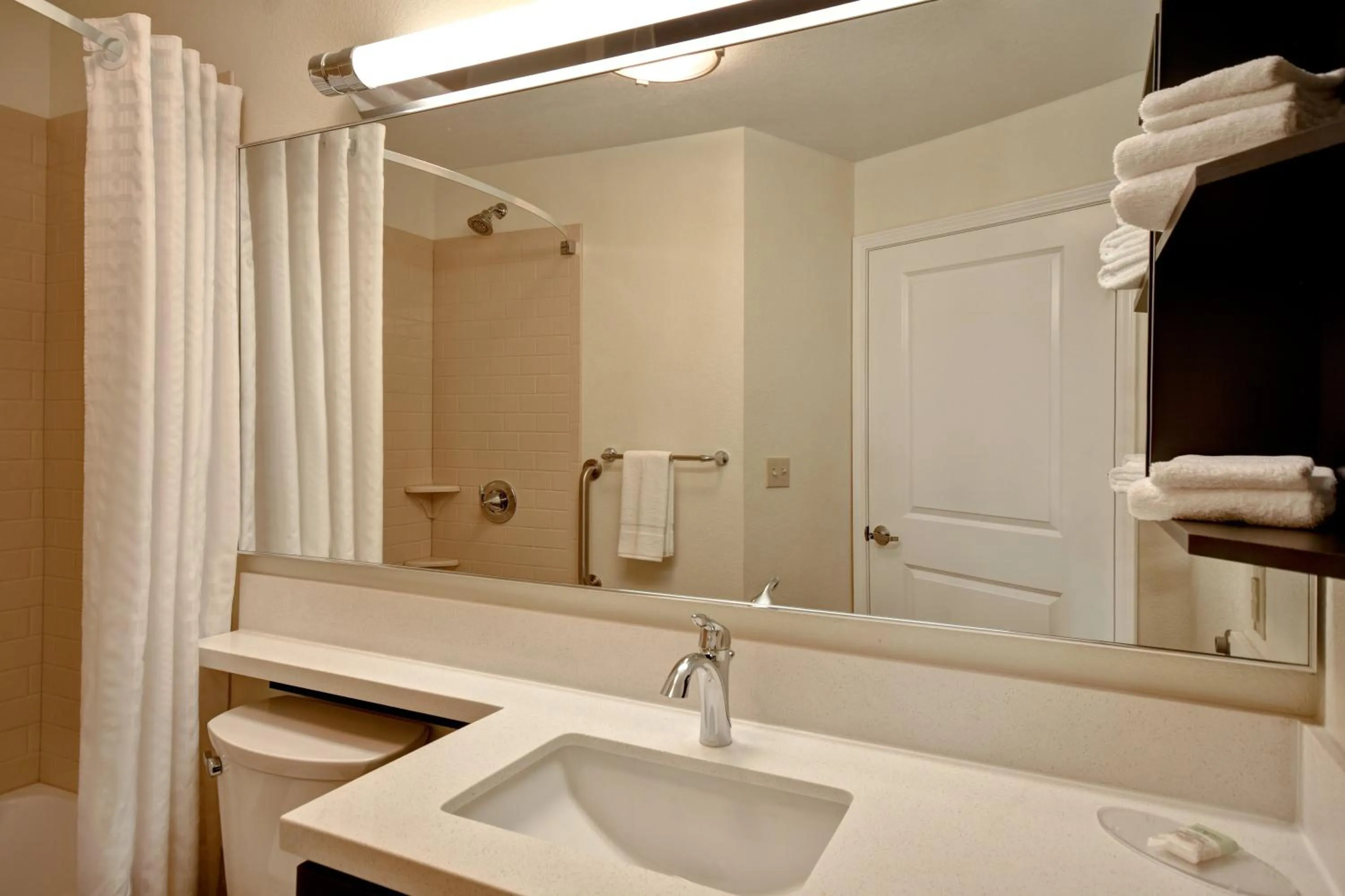 Bathroom in Candlewood Suites St Clairsville Wheeling Area by IHG