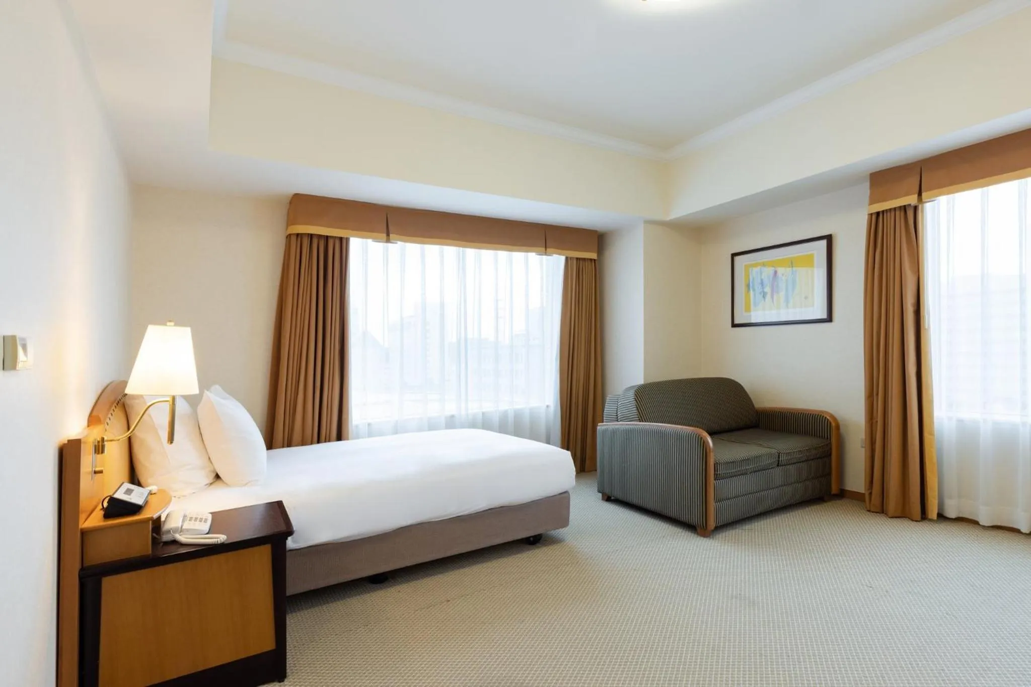 Photo of the whole room, Bed in ANA Crowne Plaza Toyama by IHG