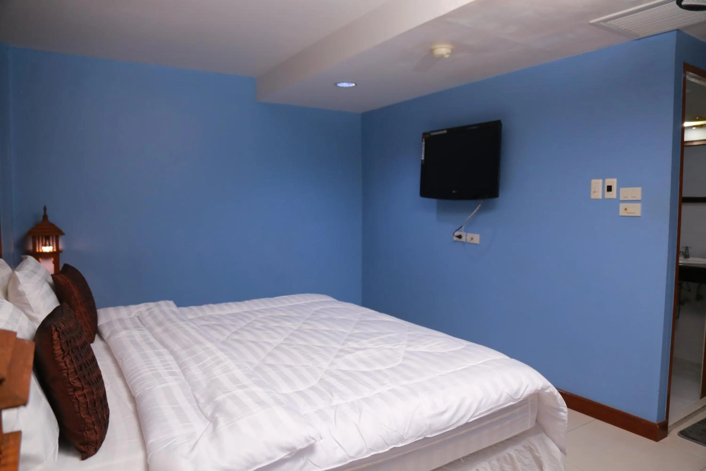 Bed in UPAR Hotels Silom