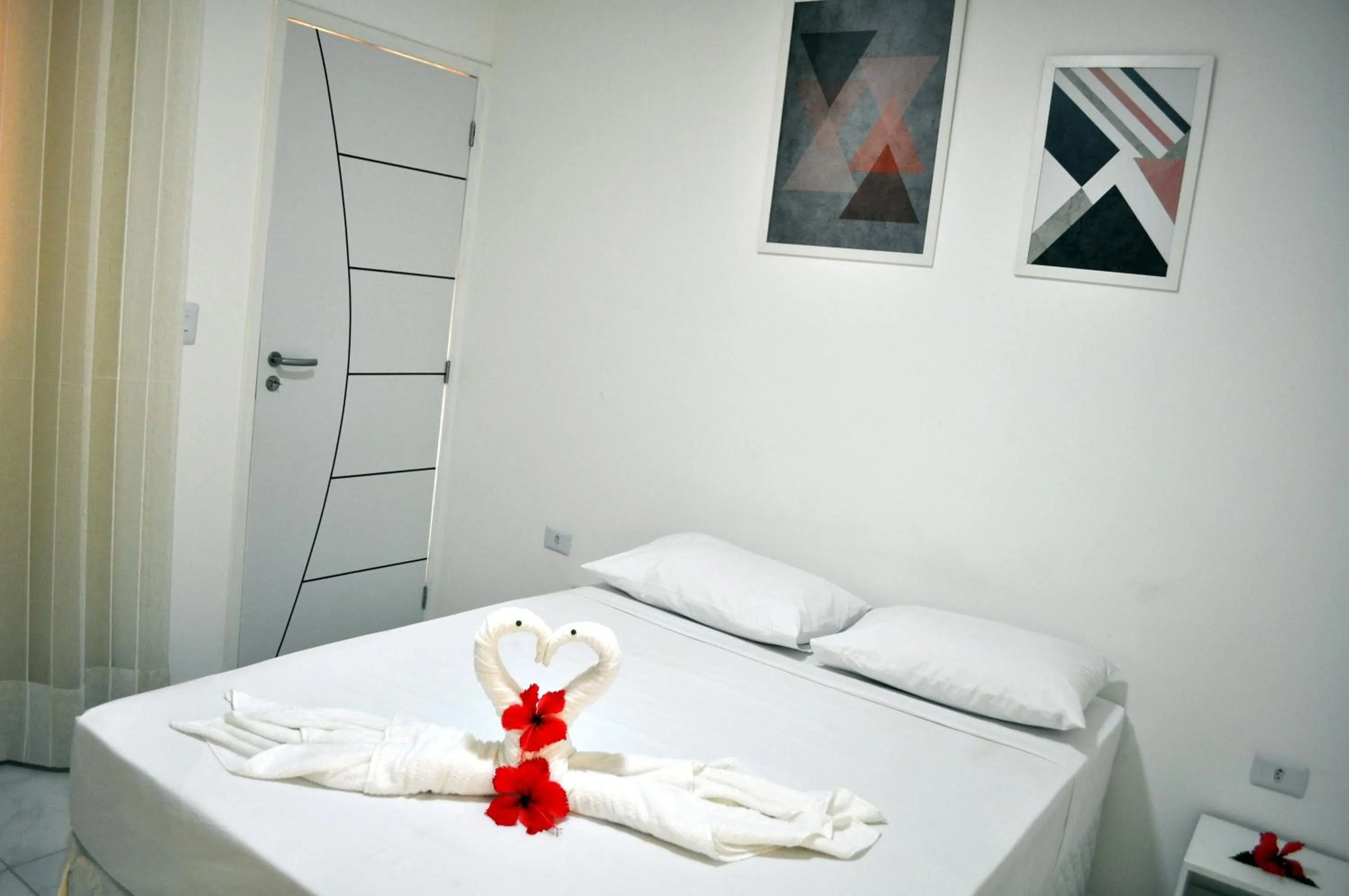 Bed in Pousada Joia Rara