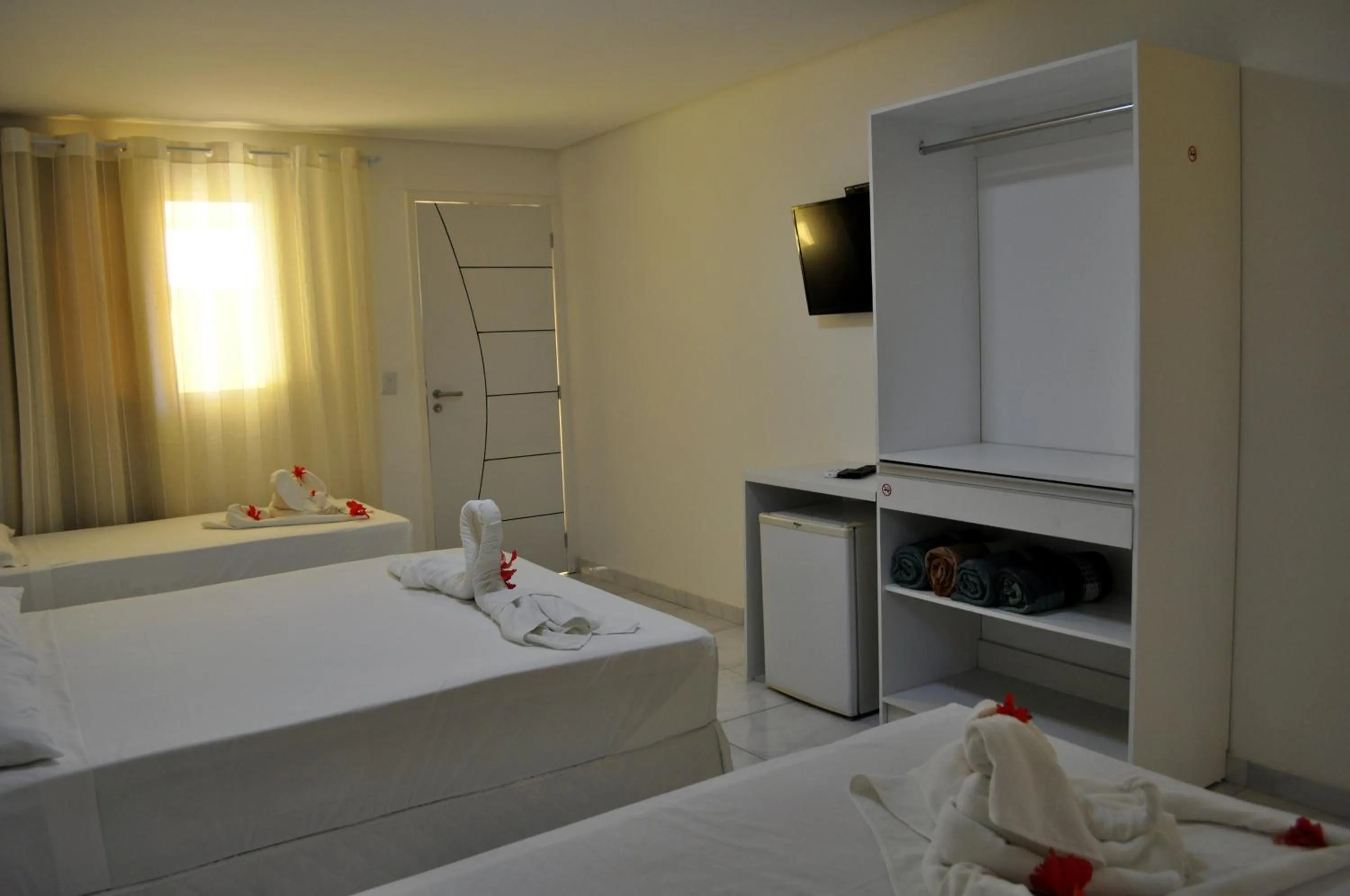 Photo of the whole room, Bed in Pousada Joia Rara