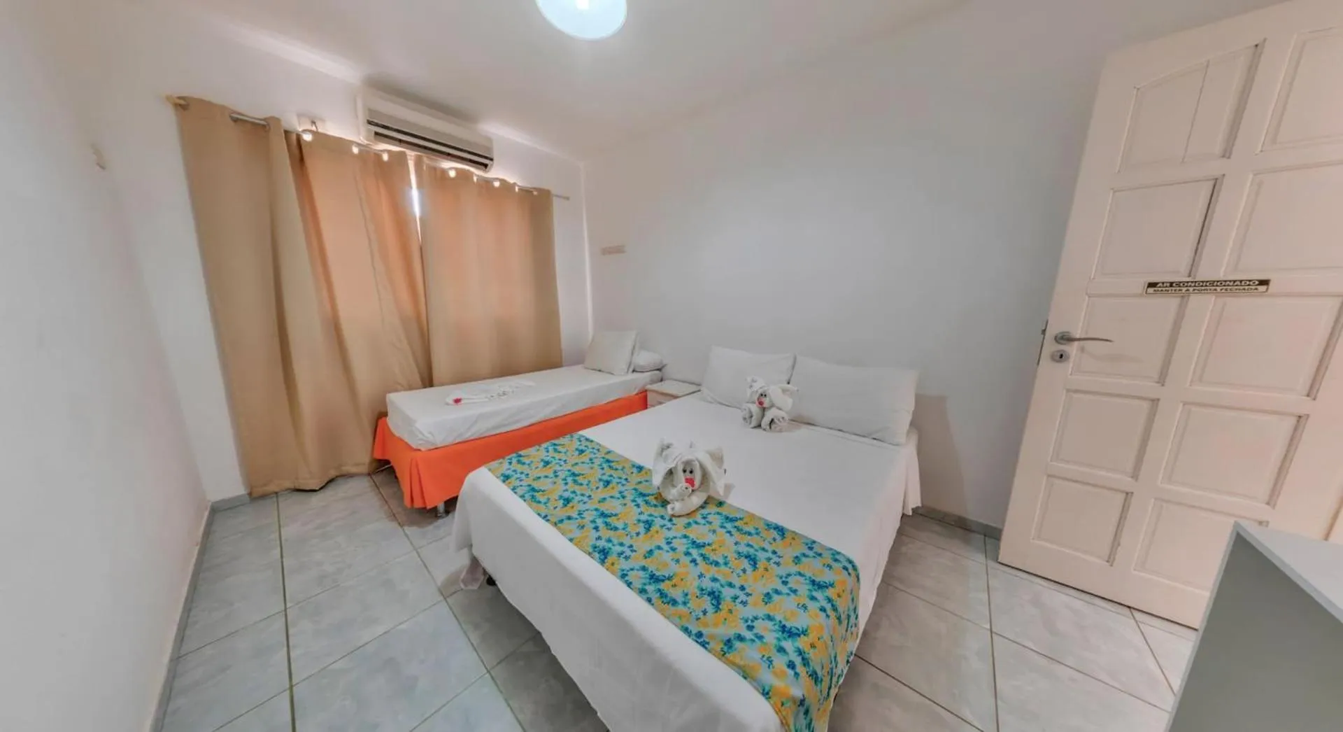 Bed in Pousada Joia Rara