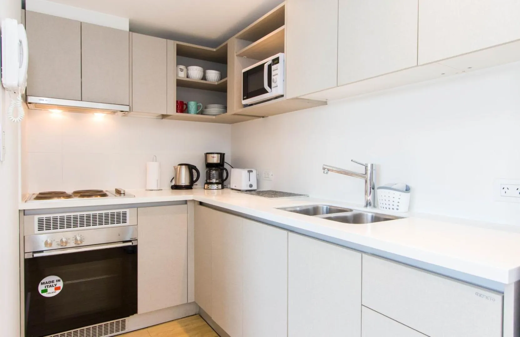 Kitchen or kitchenette in Pacifico Apartamentos