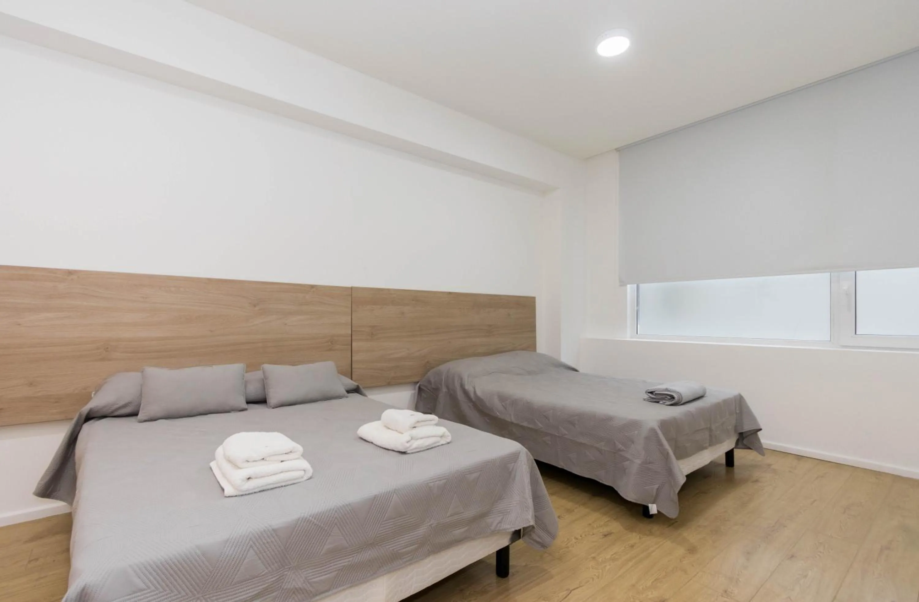 Bed in Pacifico Apartamentos