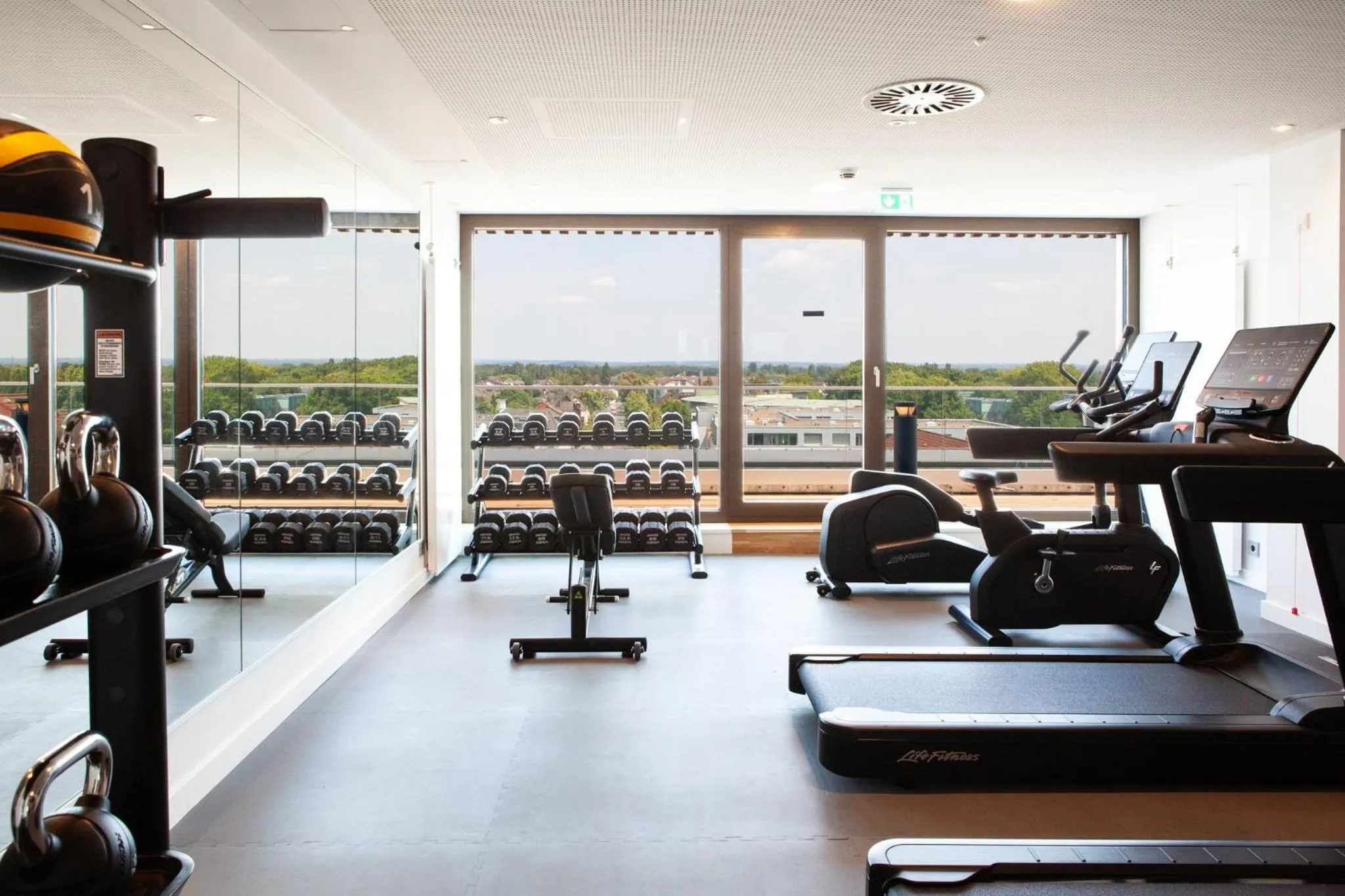 Fitness centre/facilities in Holiday Inn Express & Suites Monheim am Rhein by IHG