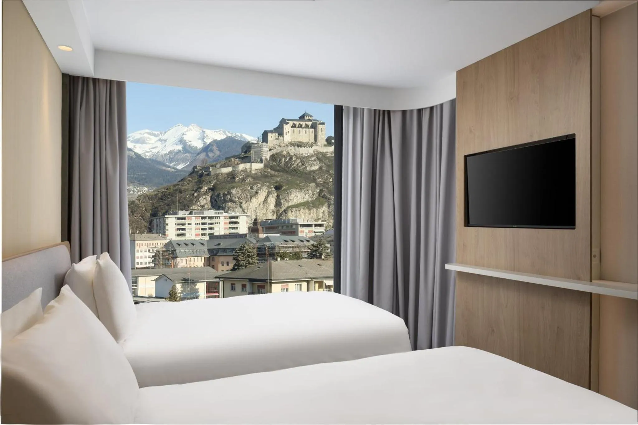 Photo of the whole room, Bed in Holiday Inn Express & Suites Sion by IHG