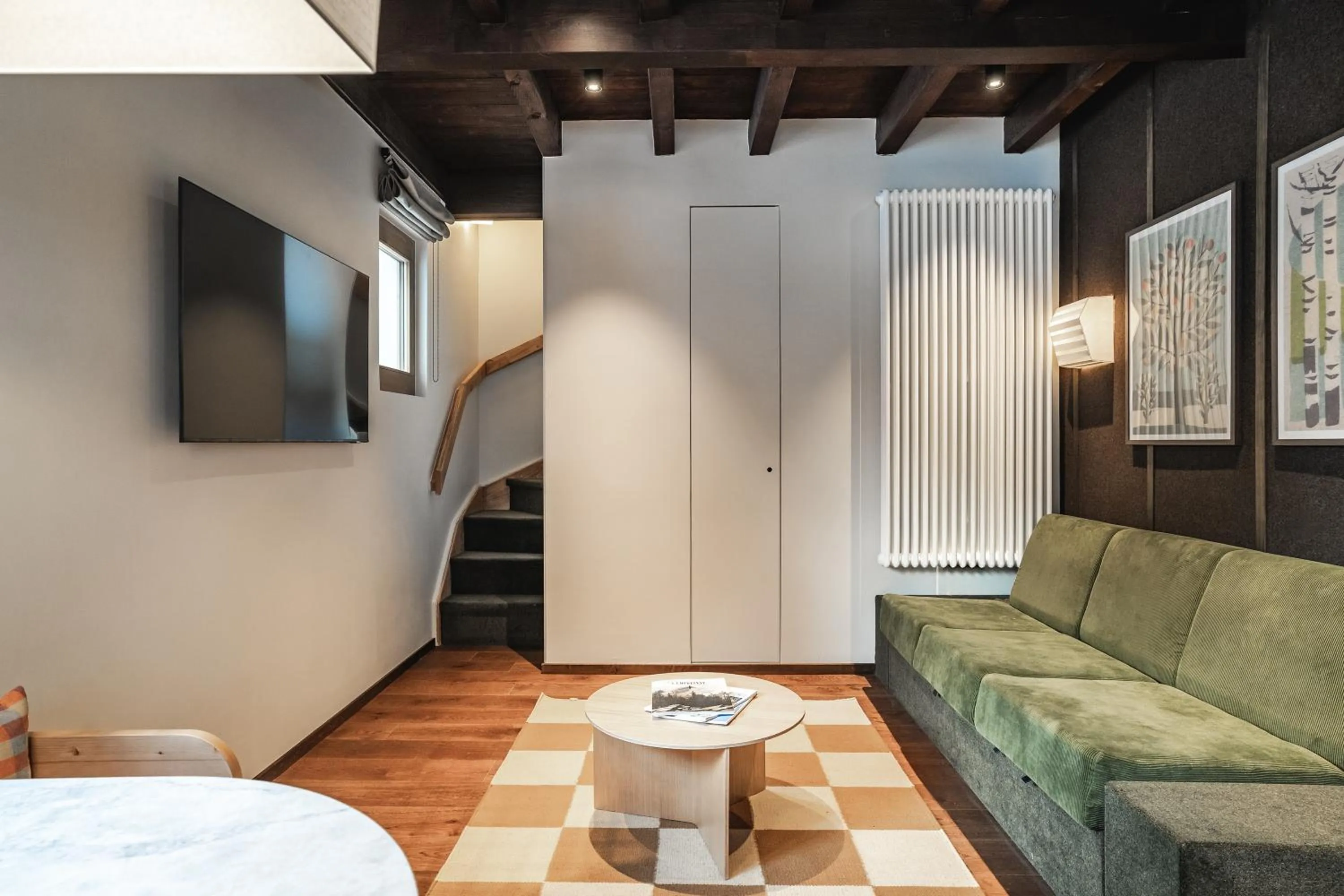 Communal lounge/ TV room in Appartements de l'Héliopic