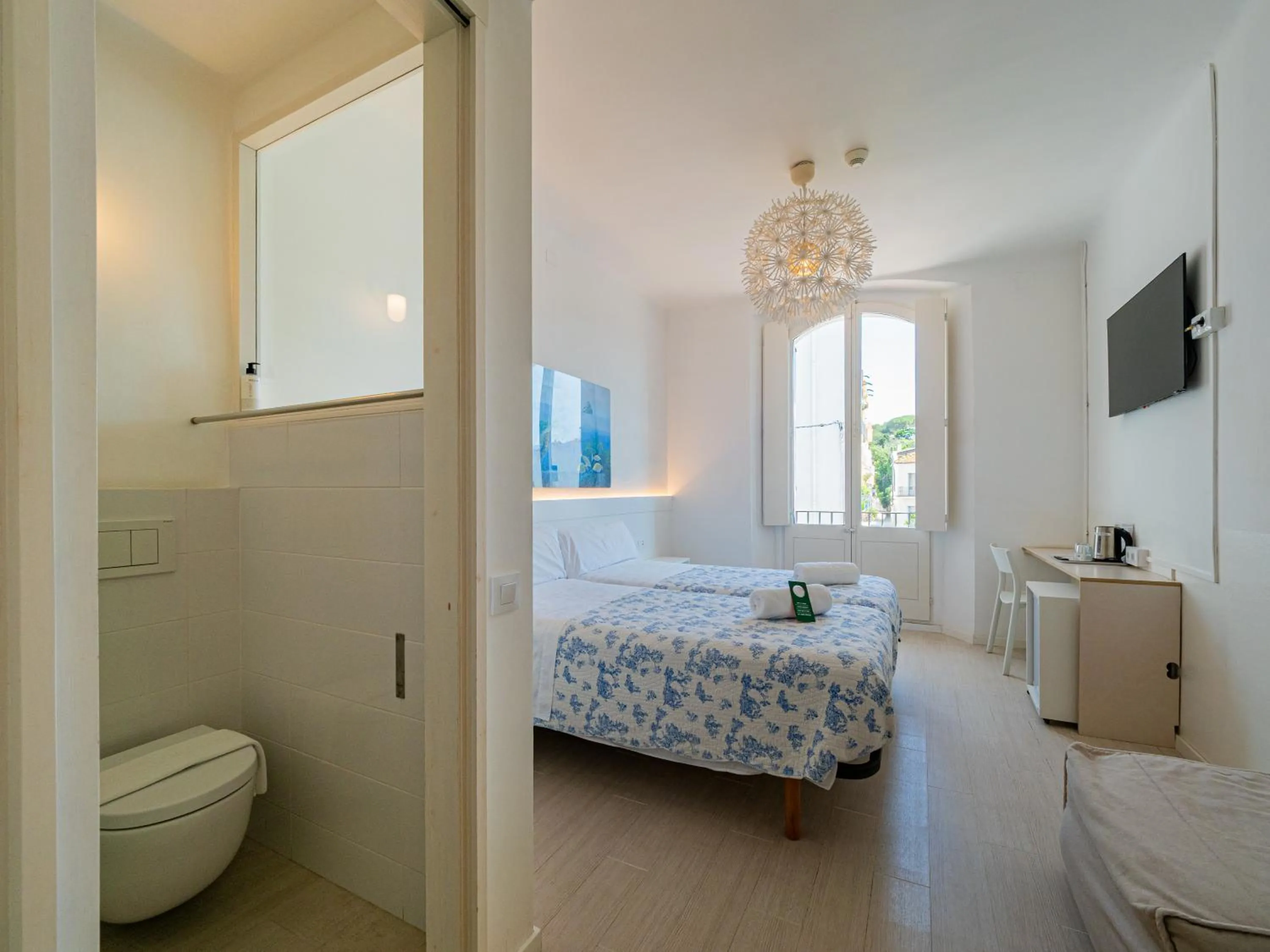 Toilet, Bed in Hostal Marina Cadaqués