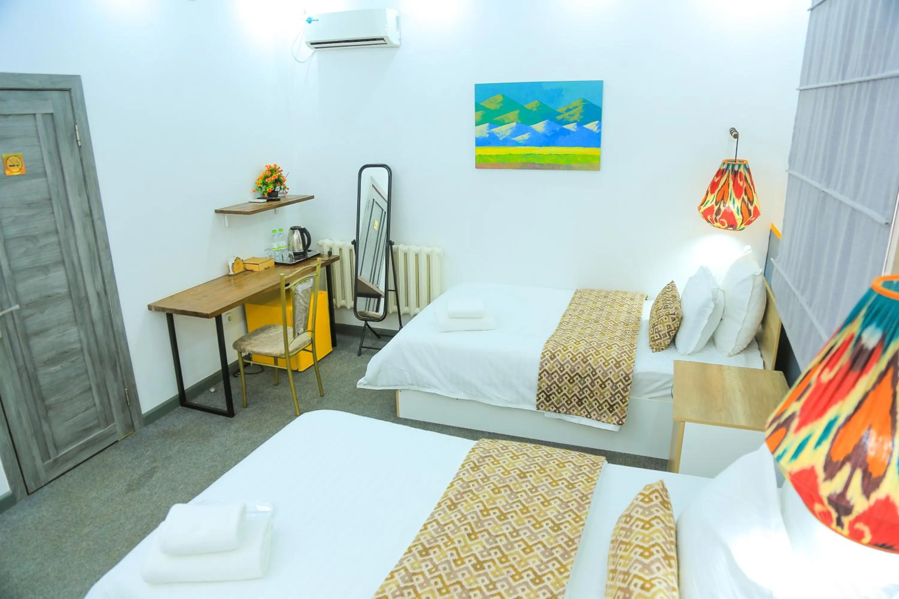 Bed in ART SAMARQAND hotel