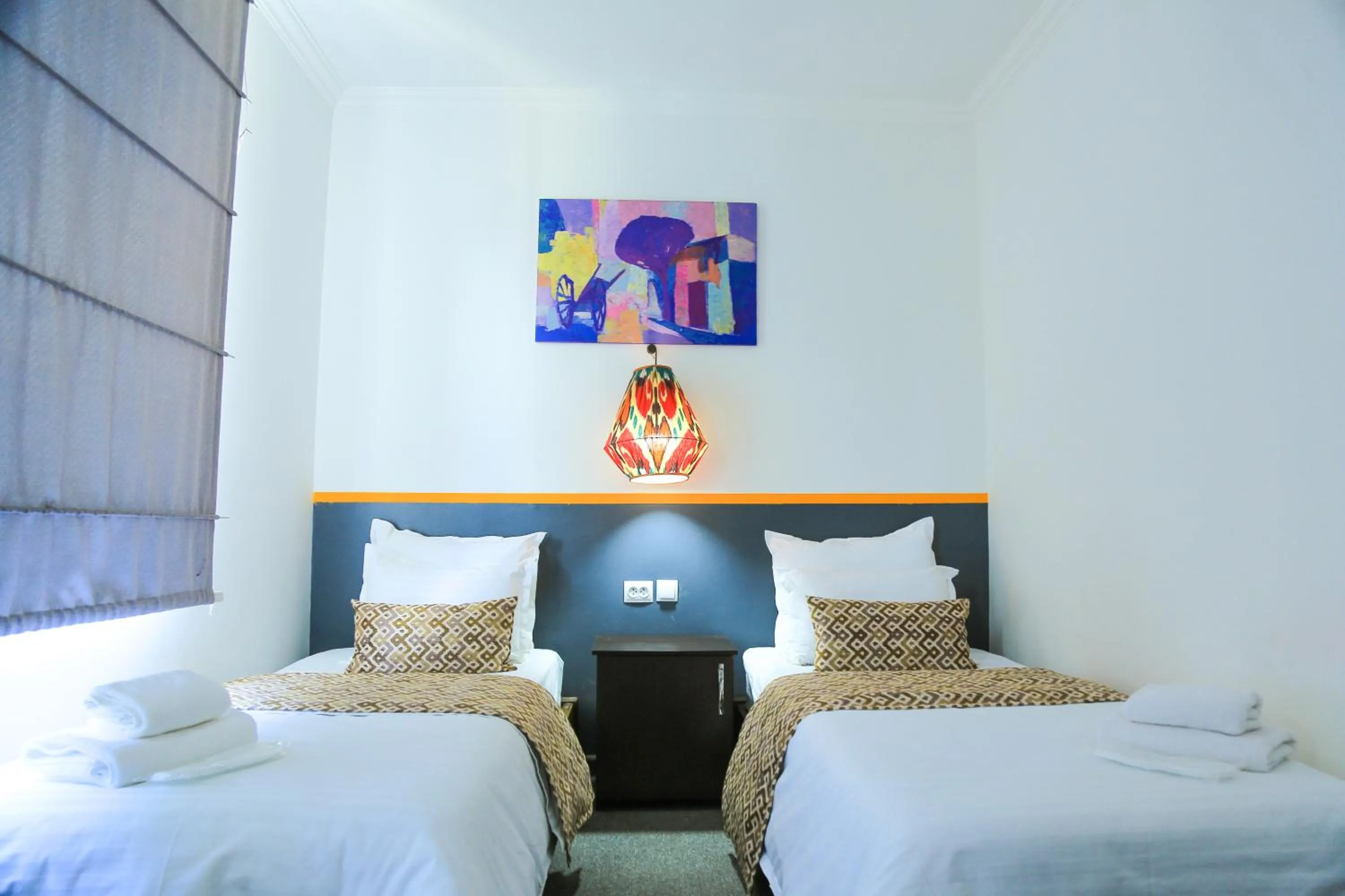 Bed in ART SAMARQAND hotel