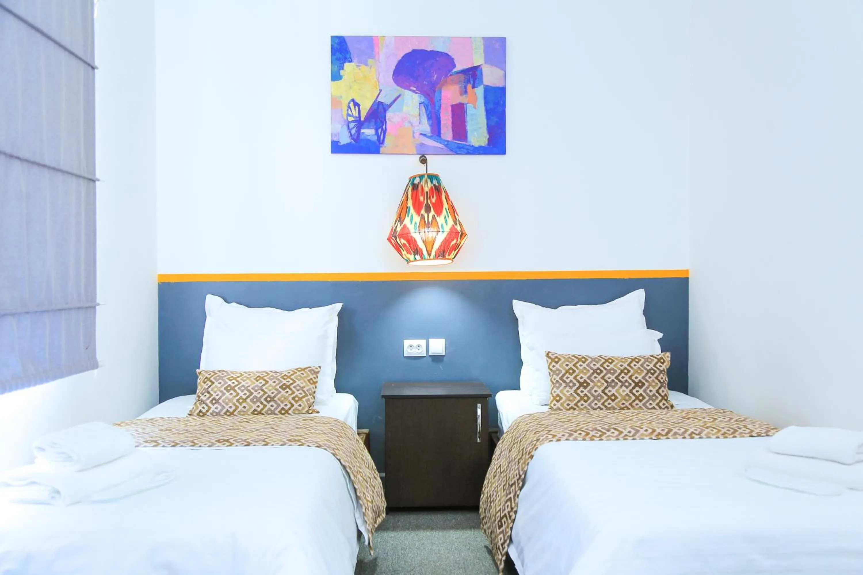 Bed in ART SAMARQAND hotel