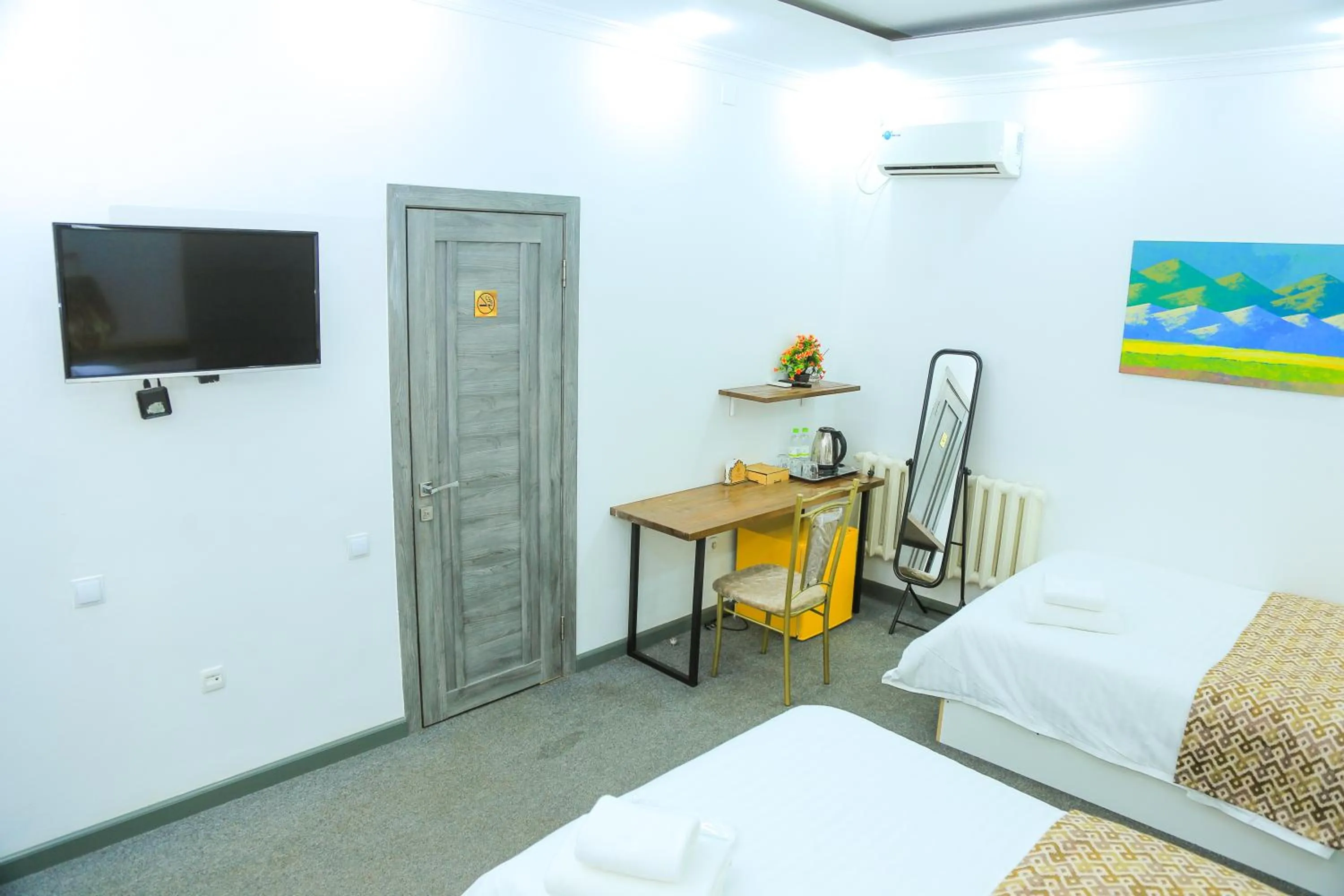 Bed in ART SAMARQAND hotel