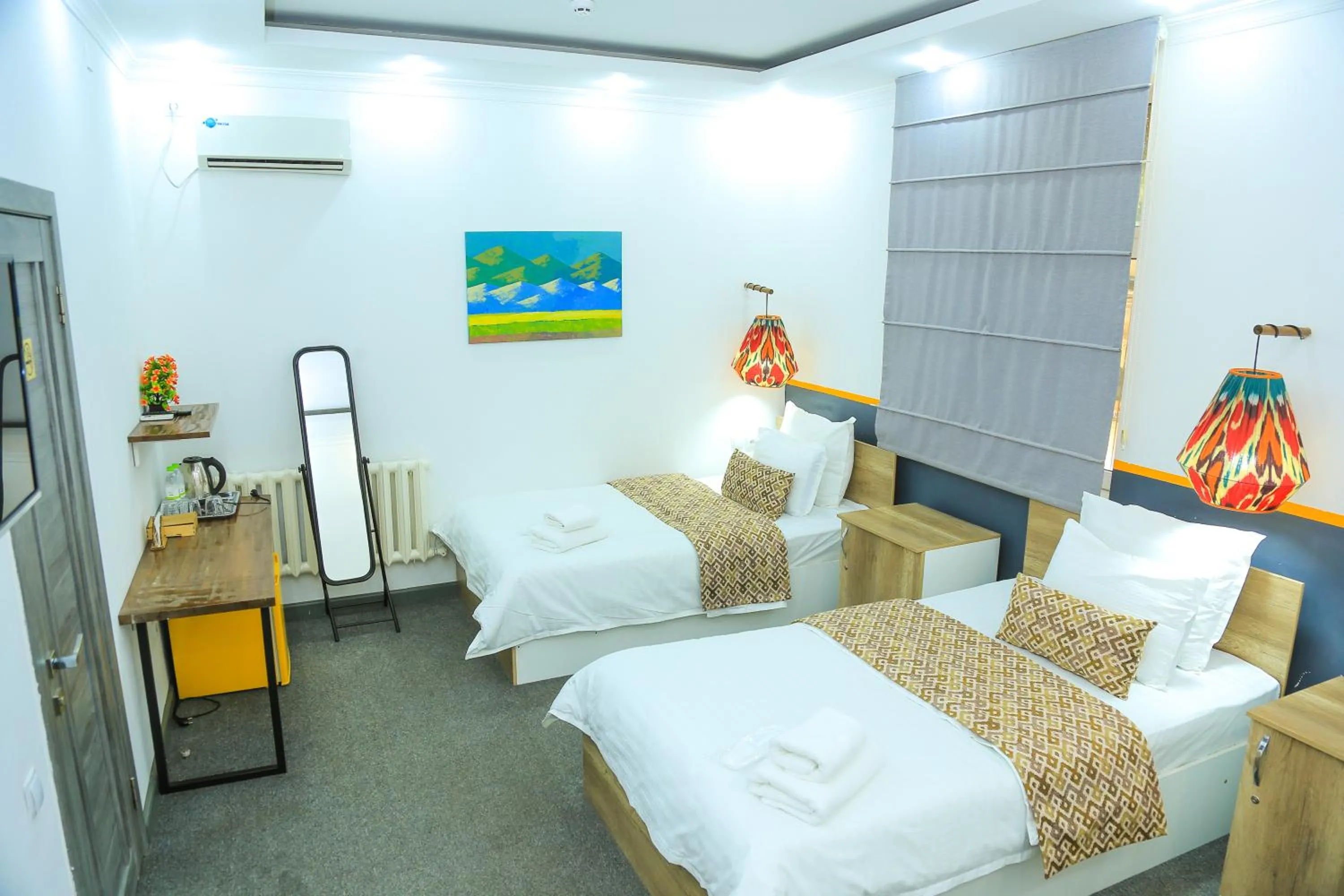 Bed in ART SAMARQAND hotel