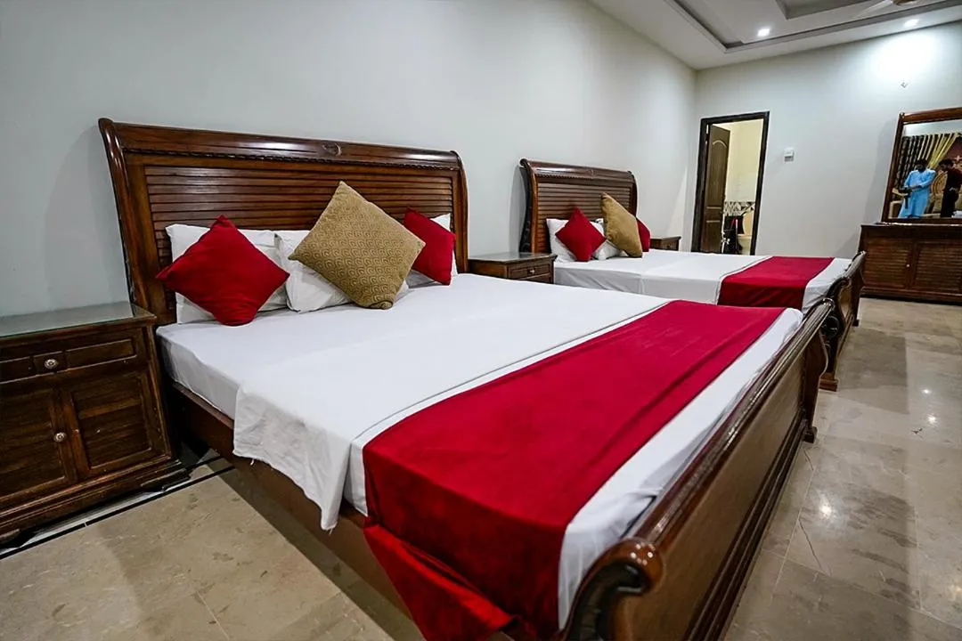 Bed in Capri Inn Guest House