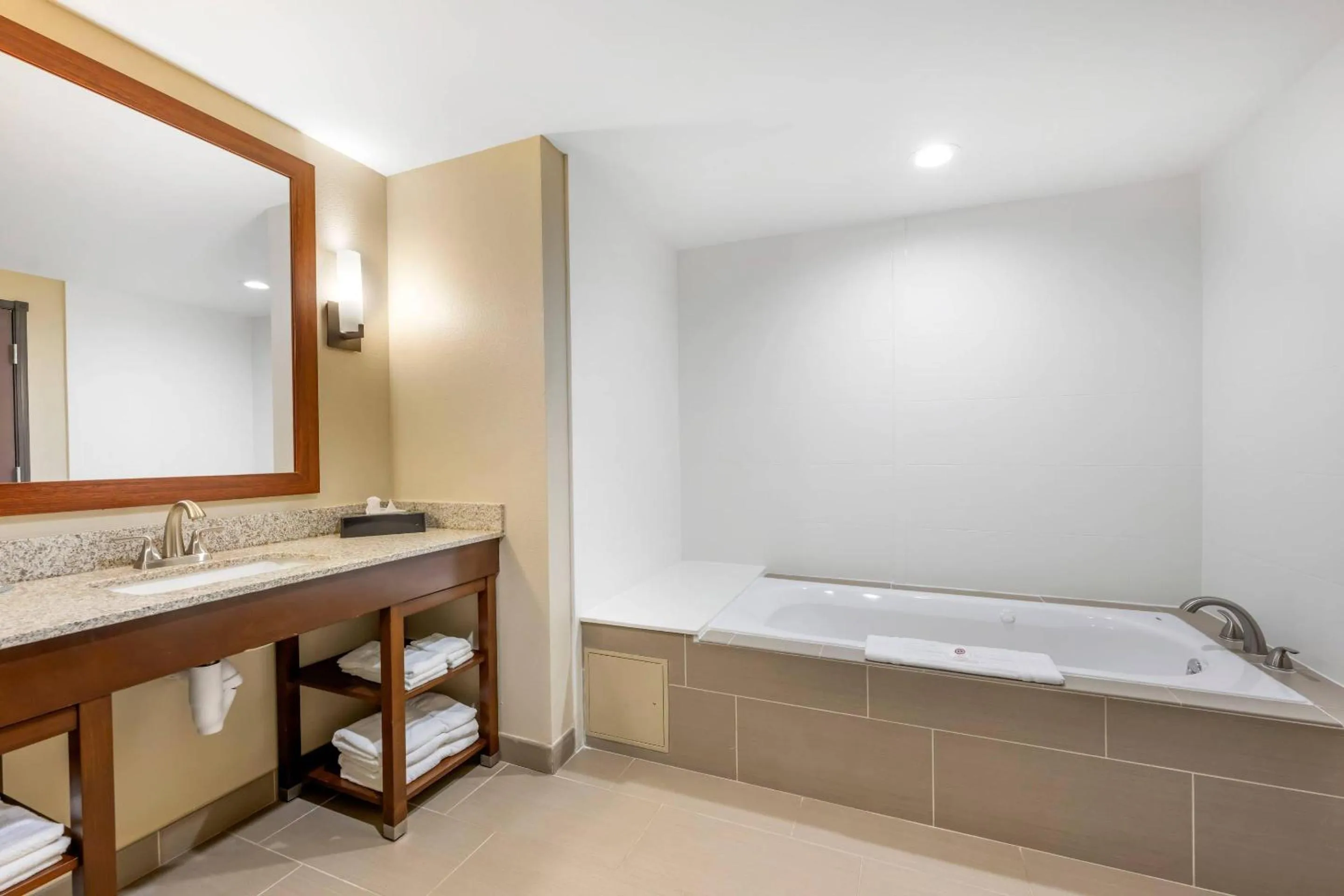 Bedroom in Comfort Suites West Omaha