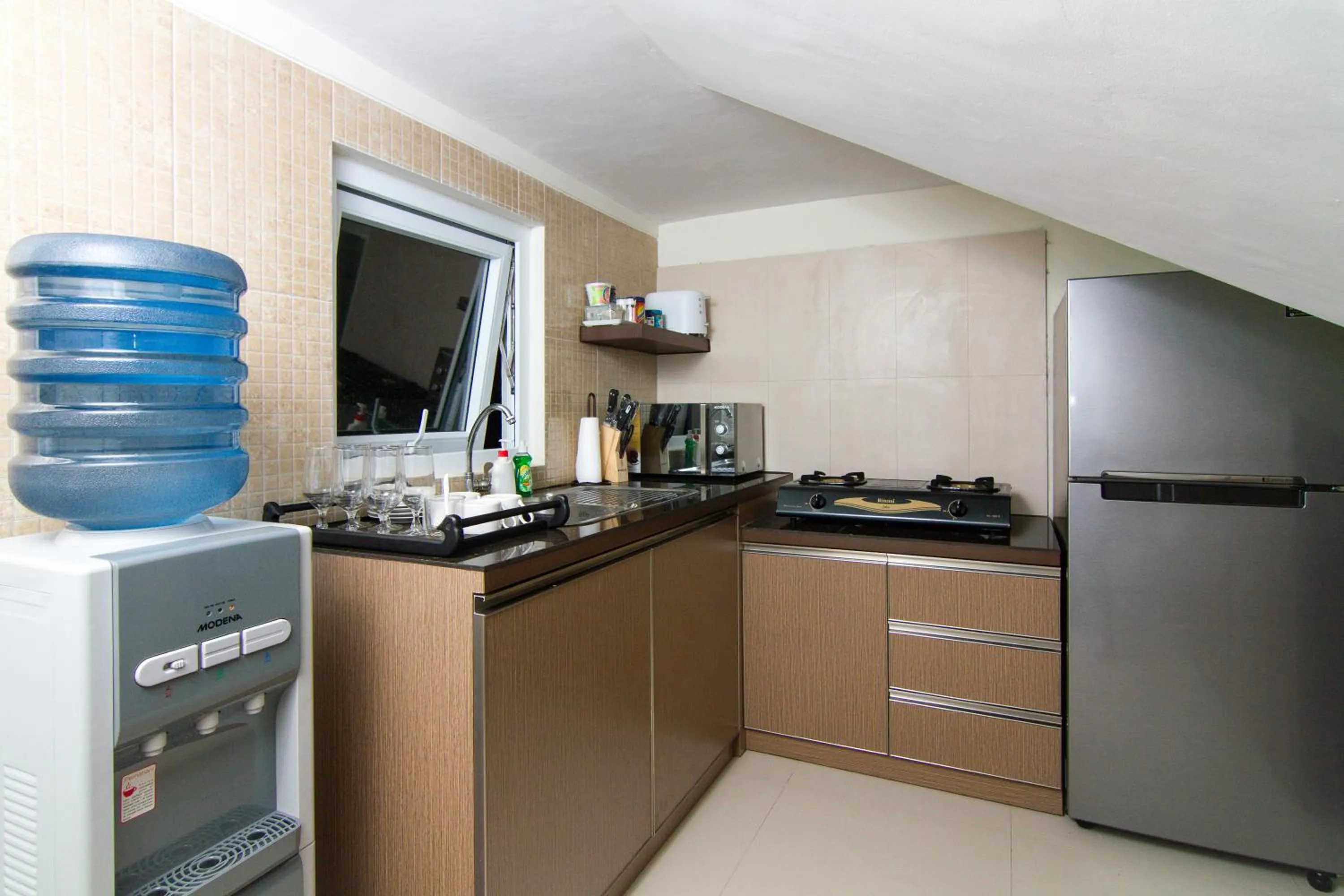 Kitchen or kitchenette in Rumah Kamang Residence