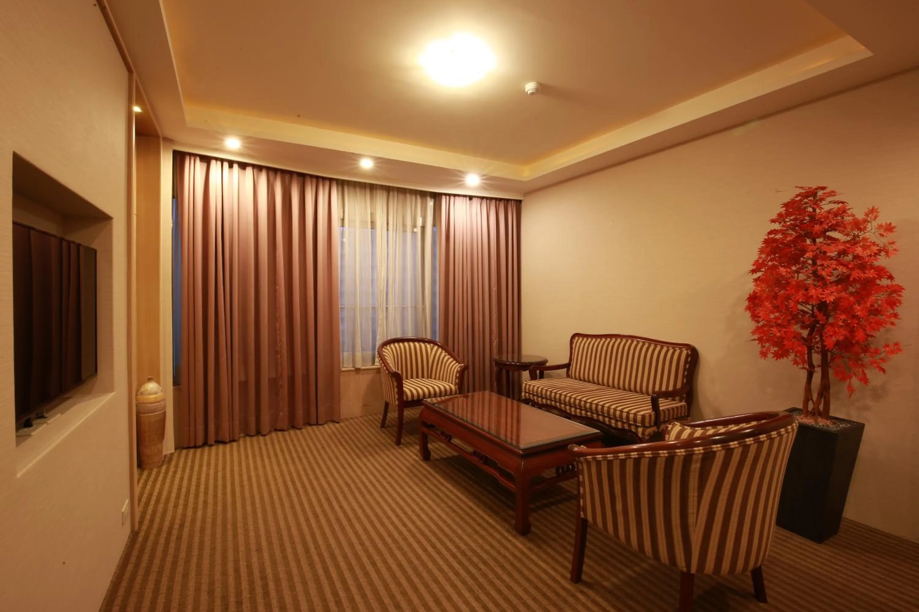 Living room in Highness Hotel