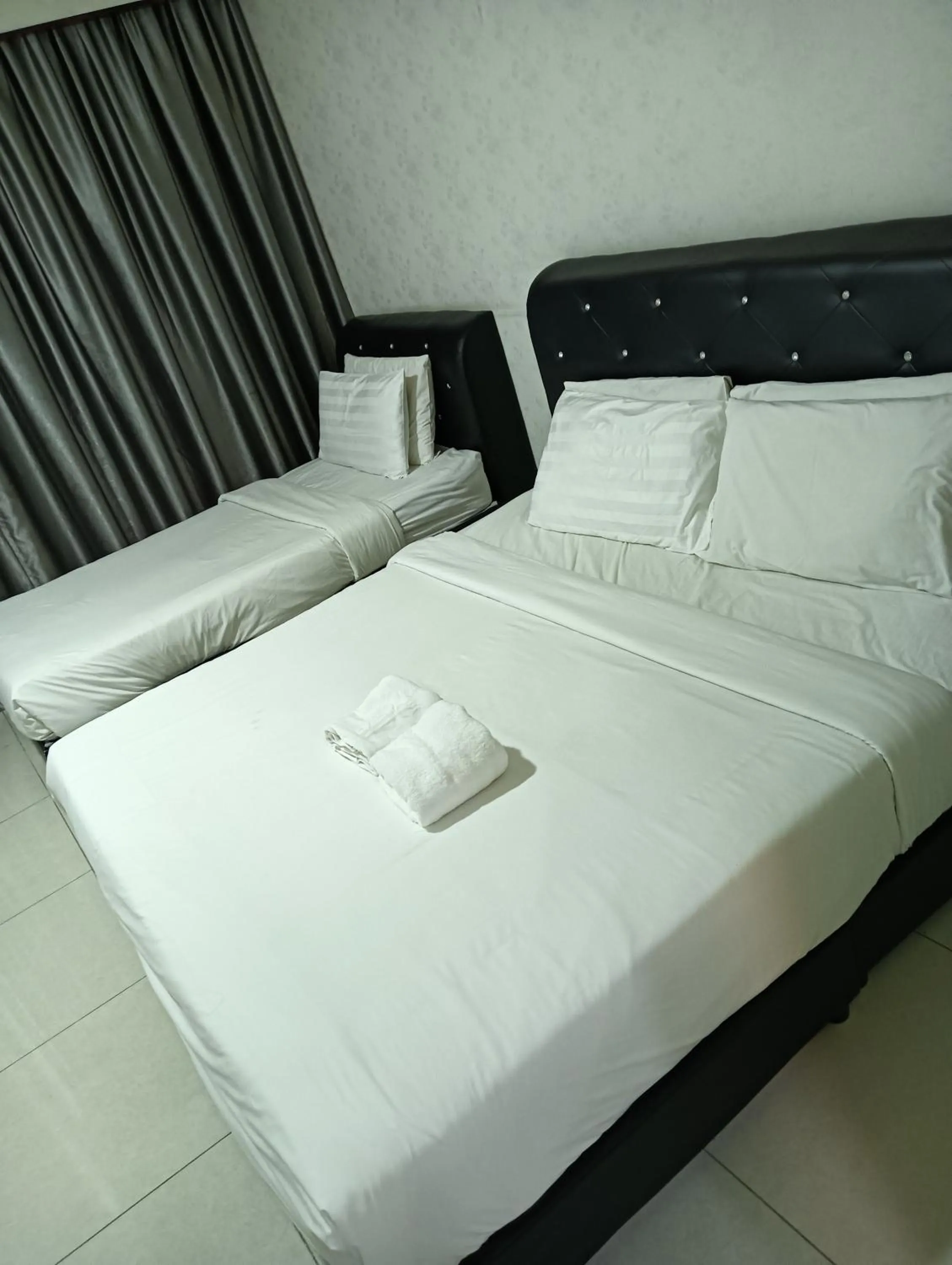 Bed in Eastern Suites Times Square KL