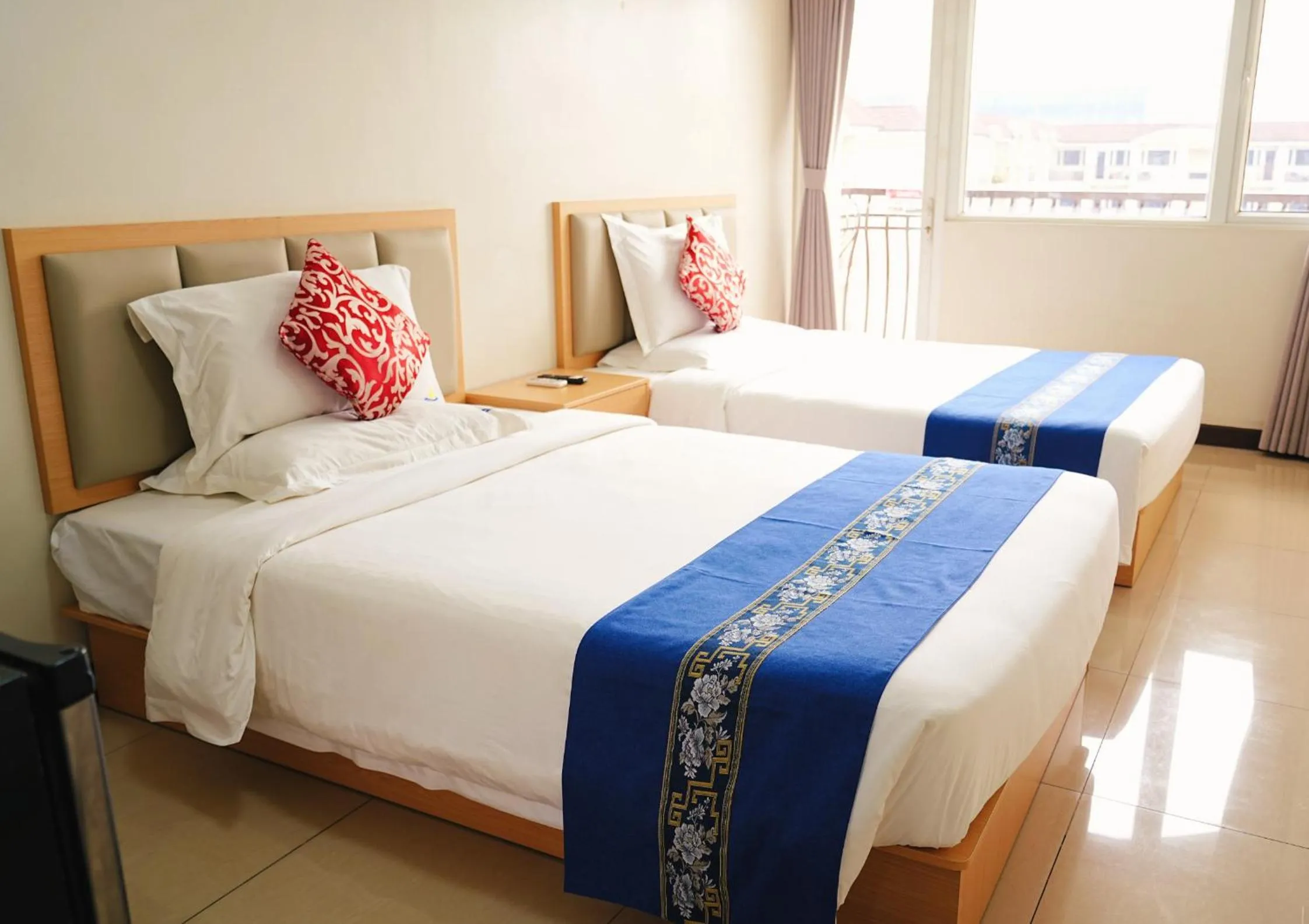 Bed in Extremeli Suites