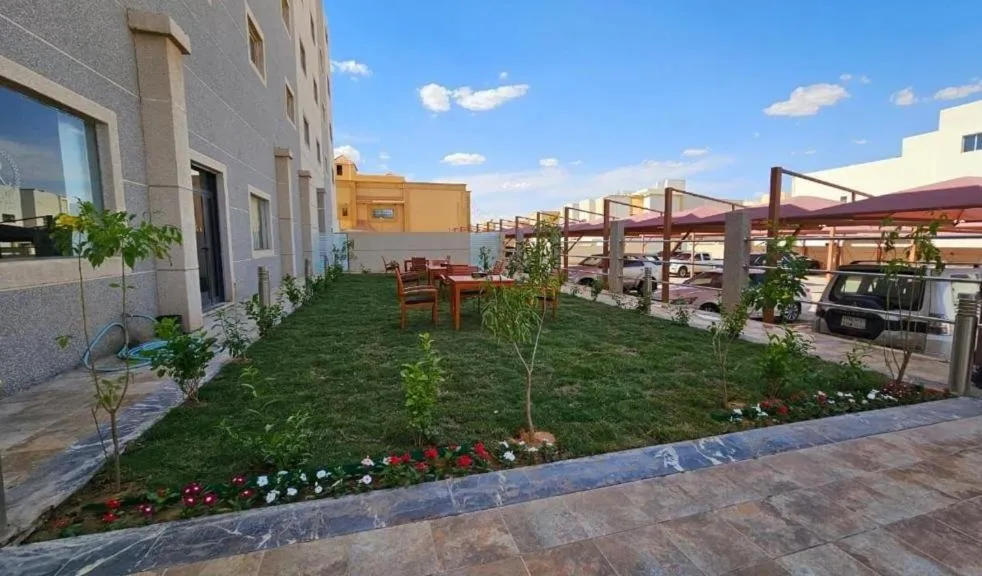 Garden in رؤوم إن للشقق الفندقية-Raoum Inn Hotel Apartments