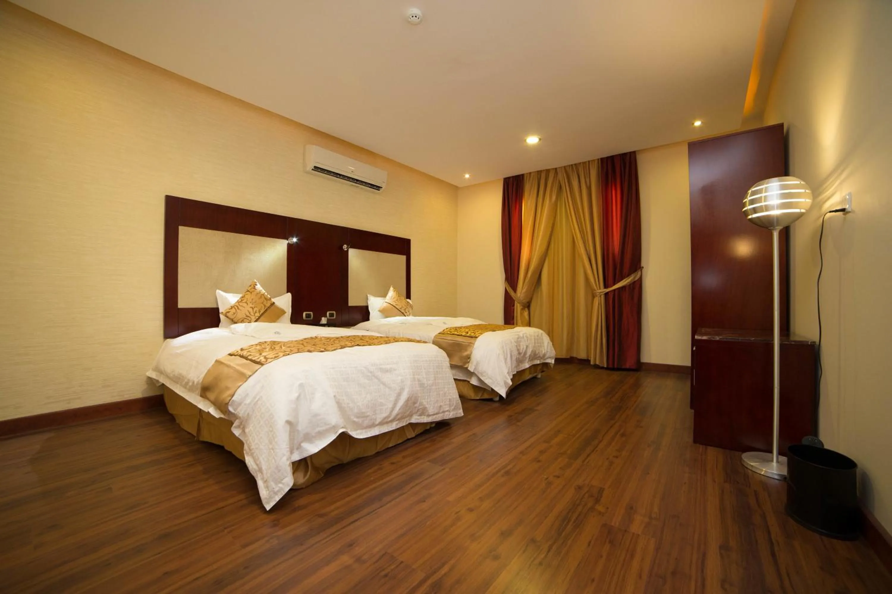 Bedroom, Bed in رؤوم إن للشقق الفندقية-Raoum Inn Hotel Apartments