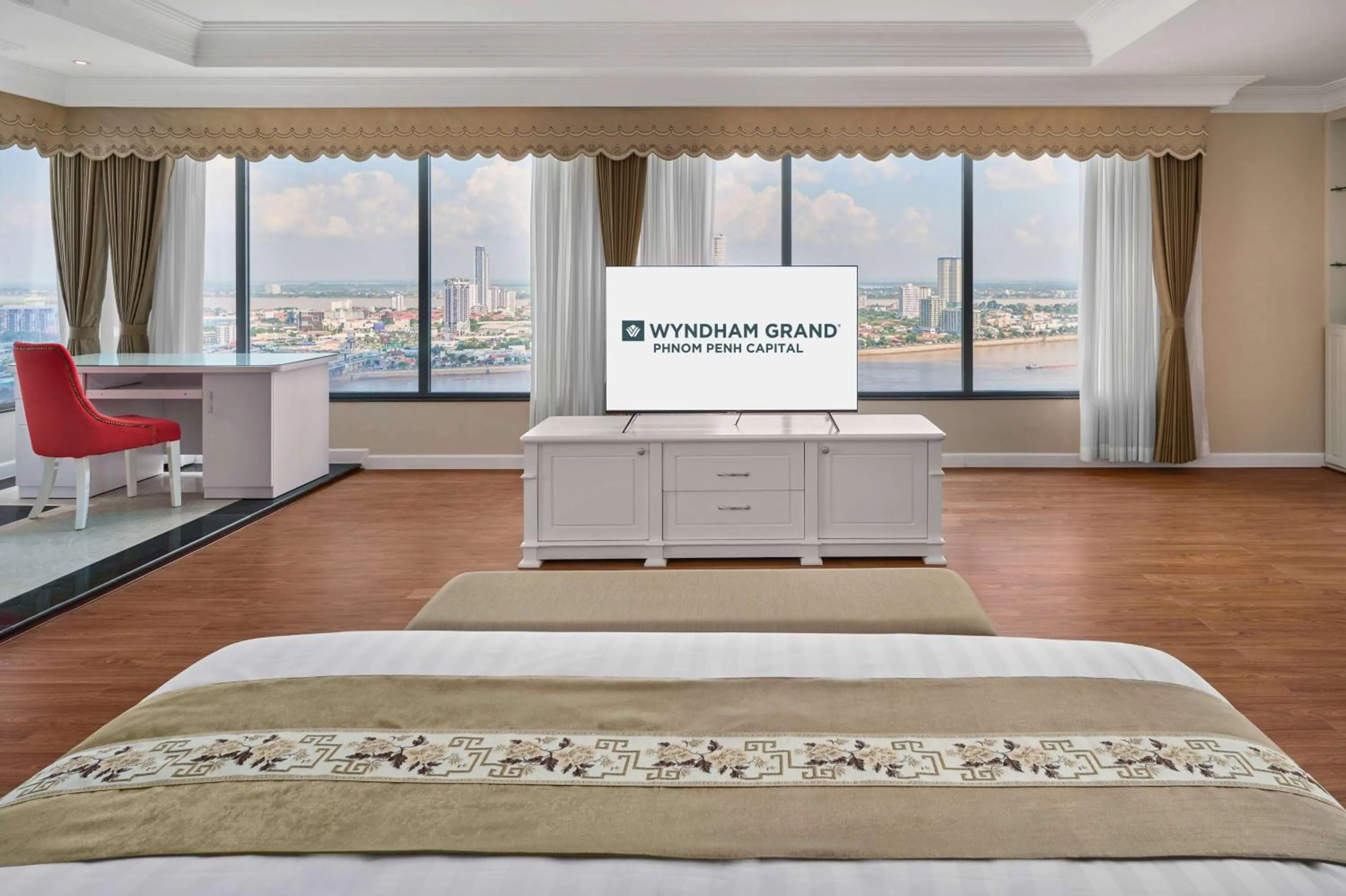 Bed in Wyndham Grand Phnom Penh Capital