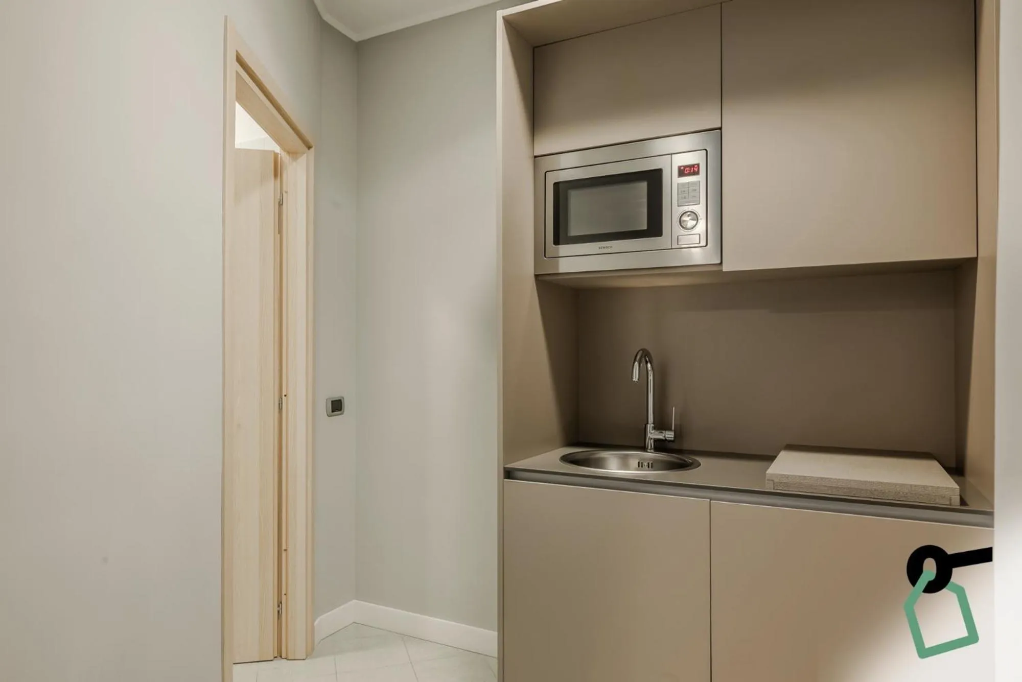 Kitchen or kitchenette in Hotiday Apartments La Spezia