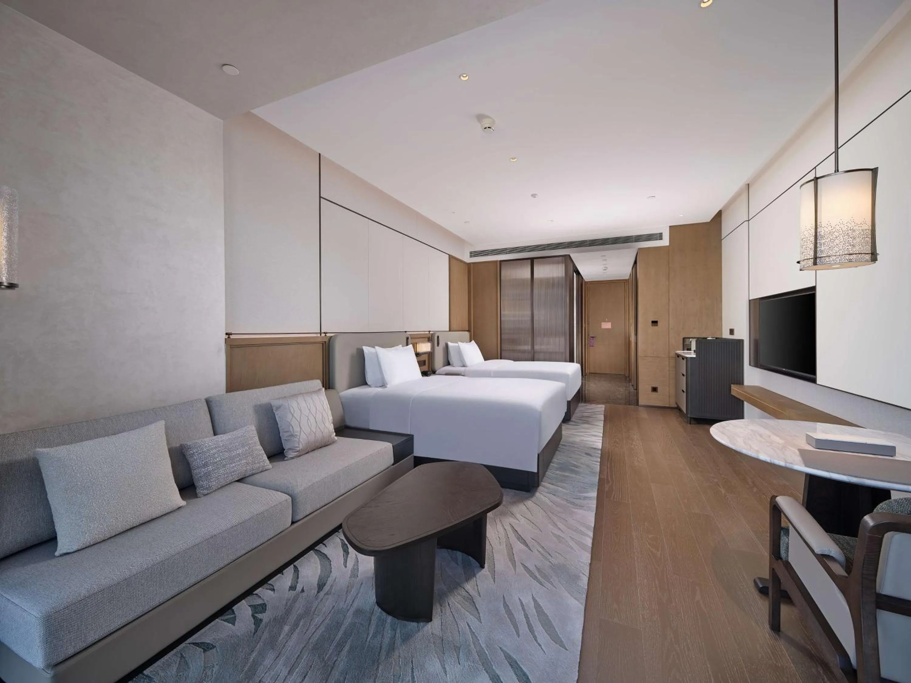 Living room, Bed in Hilton Jiashan