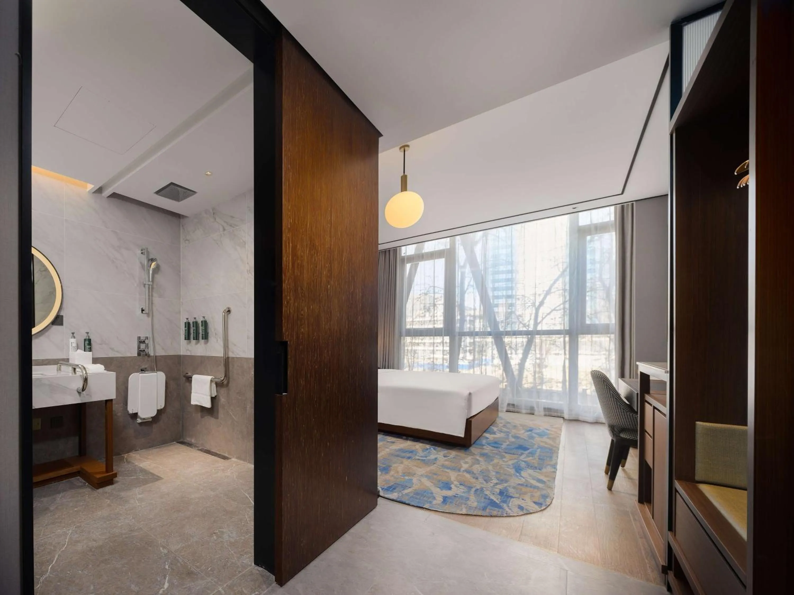 Photo of the whole room, Bed in Hilton Garden Inn Beijing Guomao