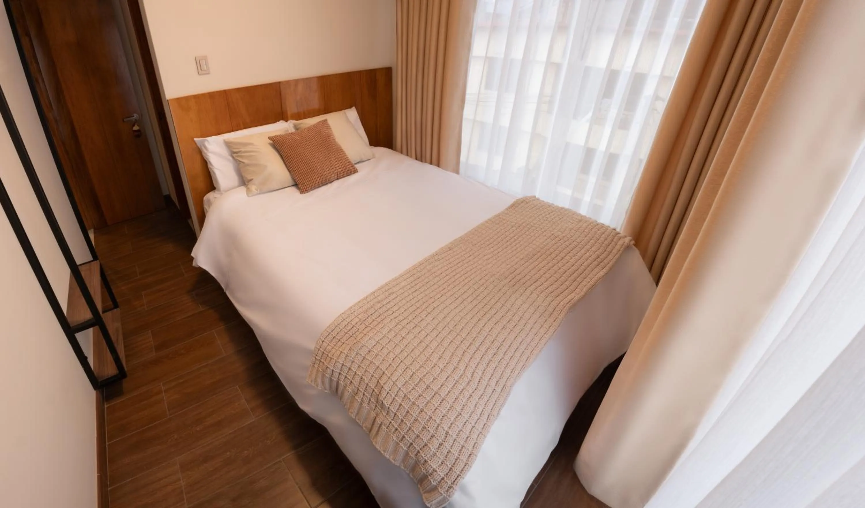 Bed in Qasamarca Hotel Boutique