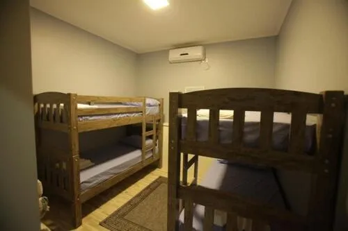 Bed in Iguassu Flats Hotel