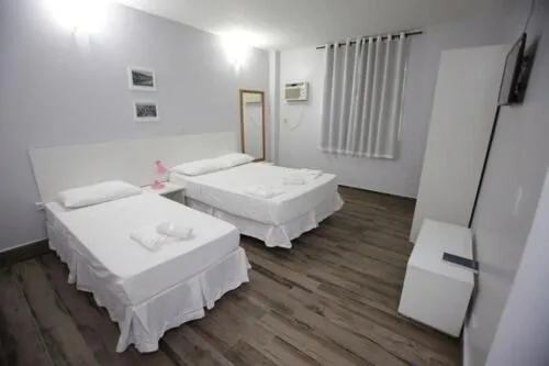 Bed in Iguassu Flats Hotel