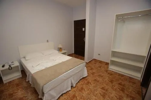 Bed in Iguassu Flats Hotel