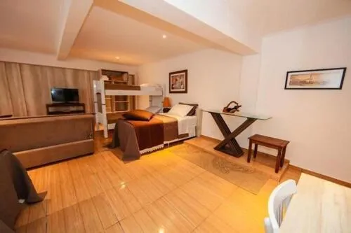 Bed in Iguassu Flats Hotel