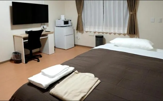 Bed in Natural Hot Spring Hotel KINSHAY