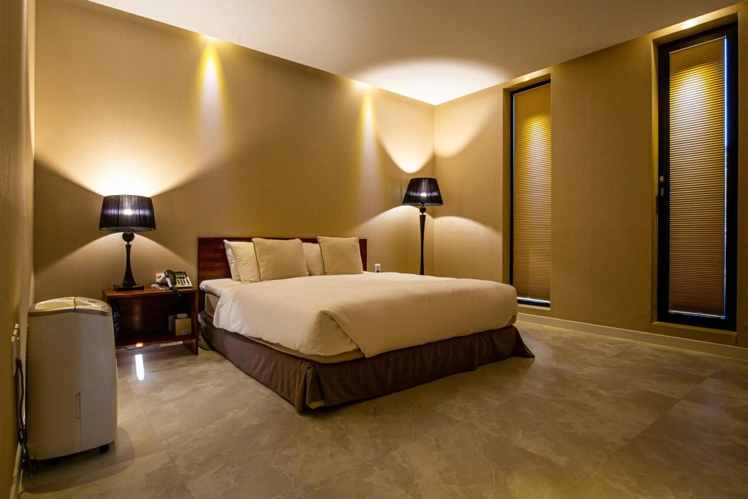 Bed in Libentia Hotel & Poolvilla