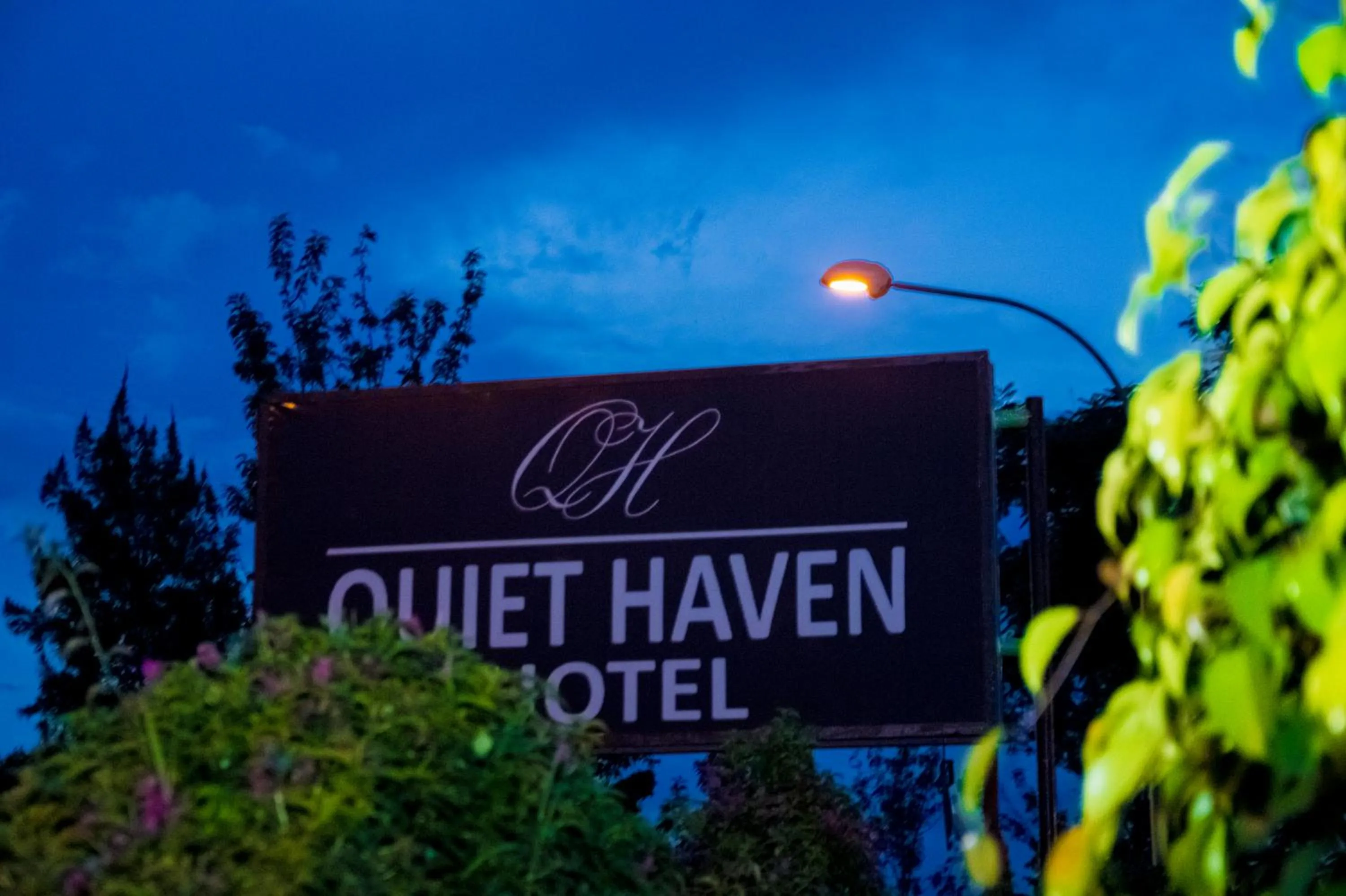 Property logo or sign in Quiet Haven Hotel