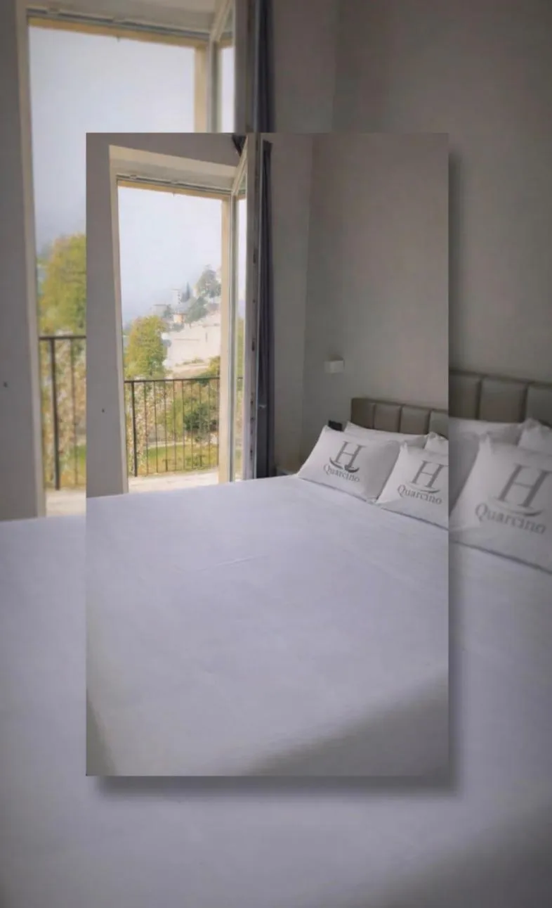 Bed in Hotel Quarcino