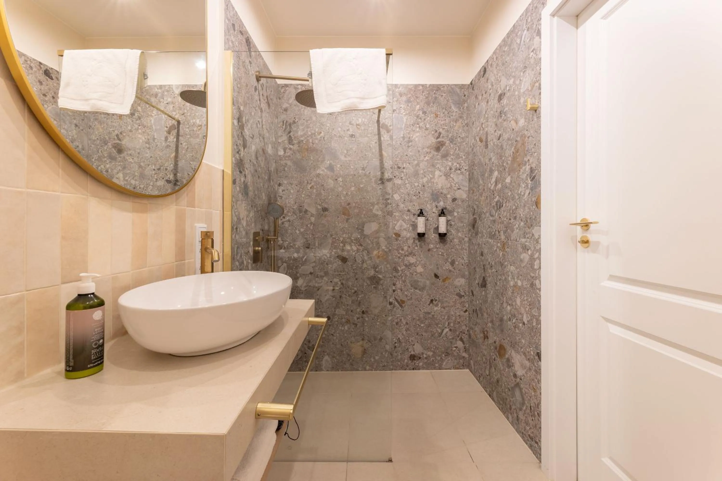 Shower in Hetman Main Square Apartments