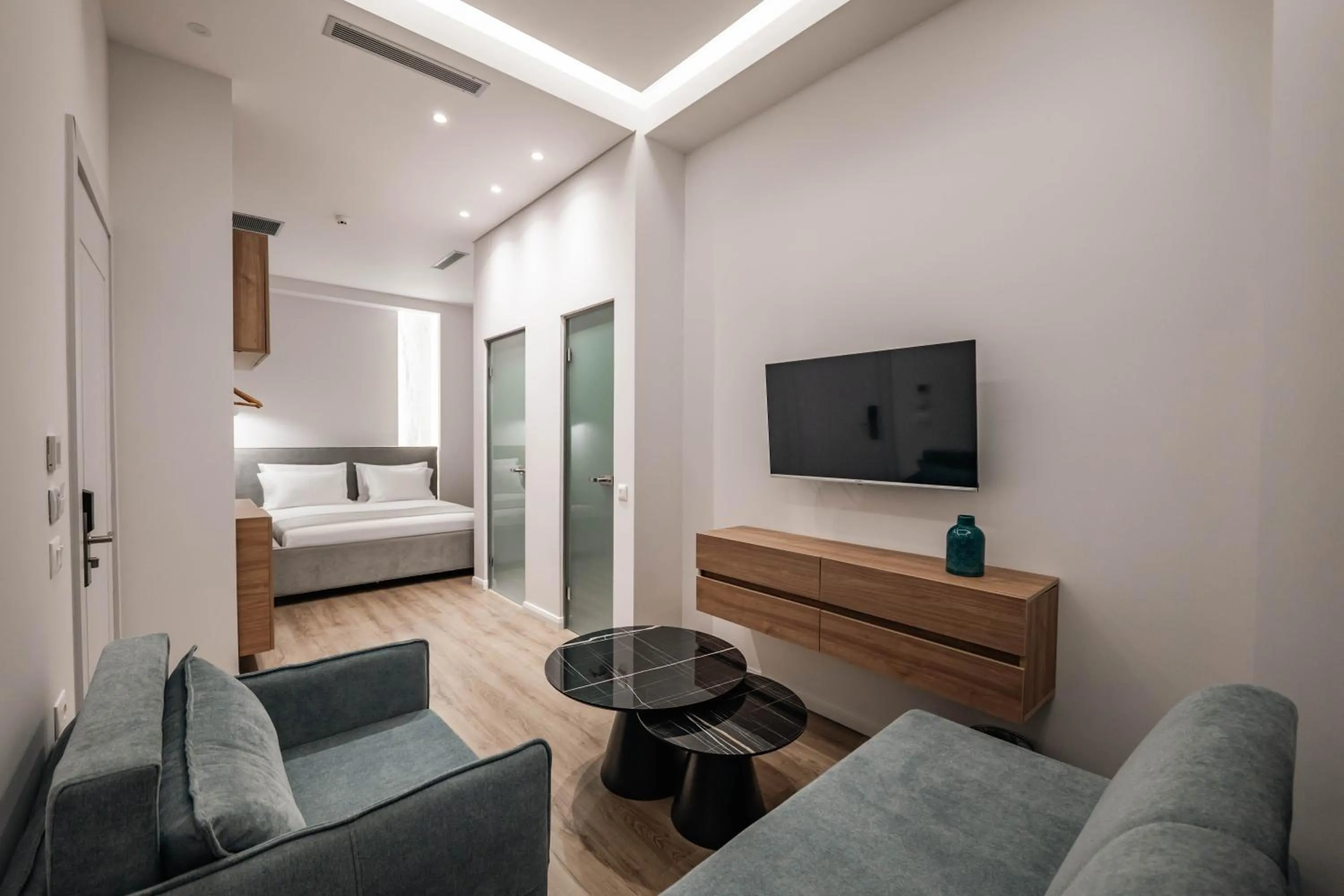 Communal lounge/ TV room, Bed in Mae Select Hotel