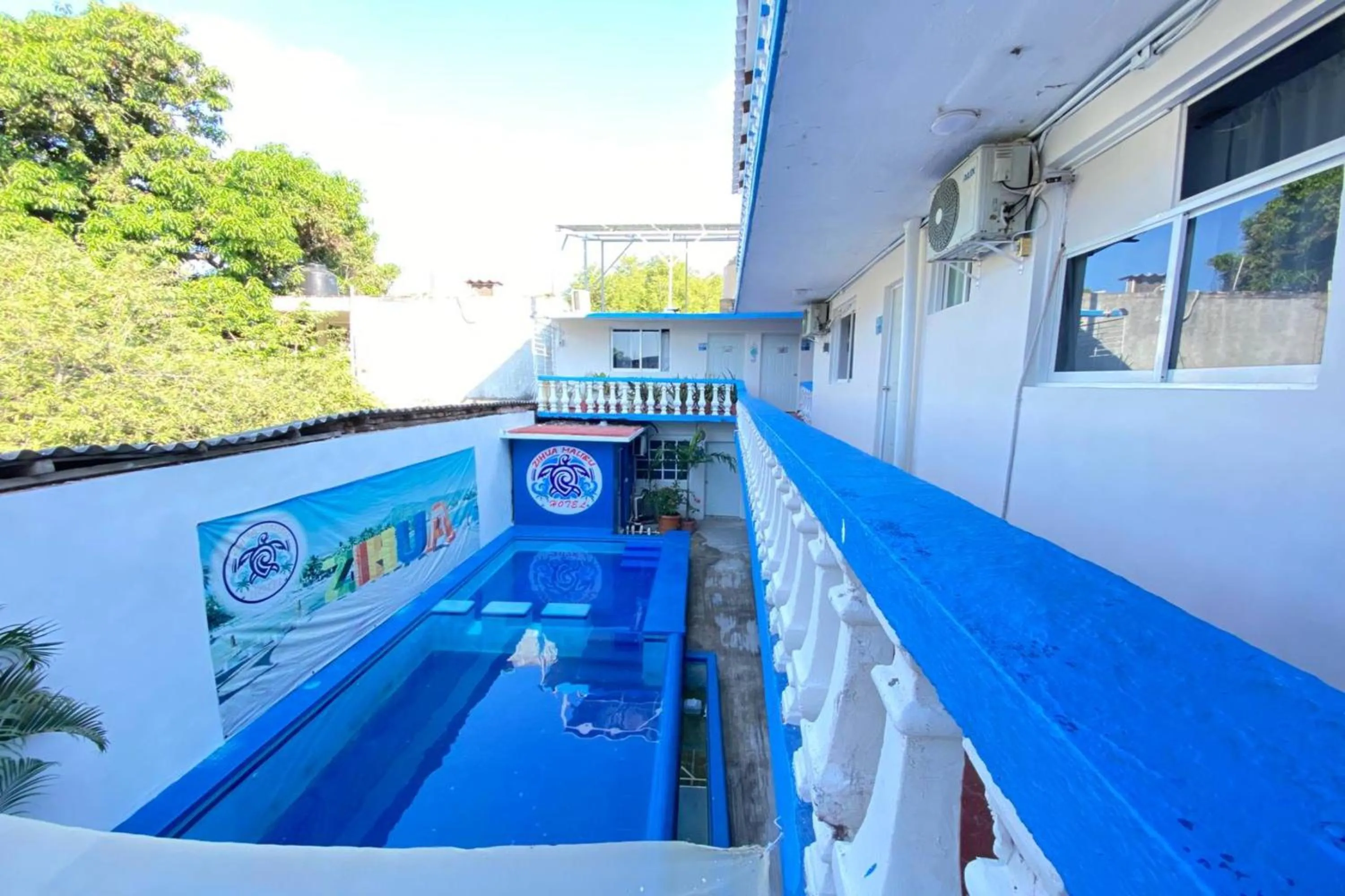 Swimming pool in OYO Hotel Zihuatanejo Malibu