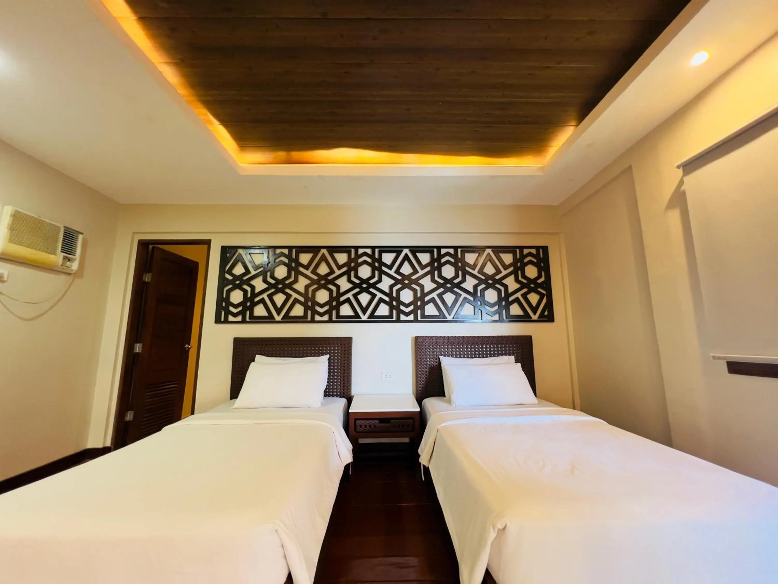 Bed in Alam Indah Beach Resort Busuanga