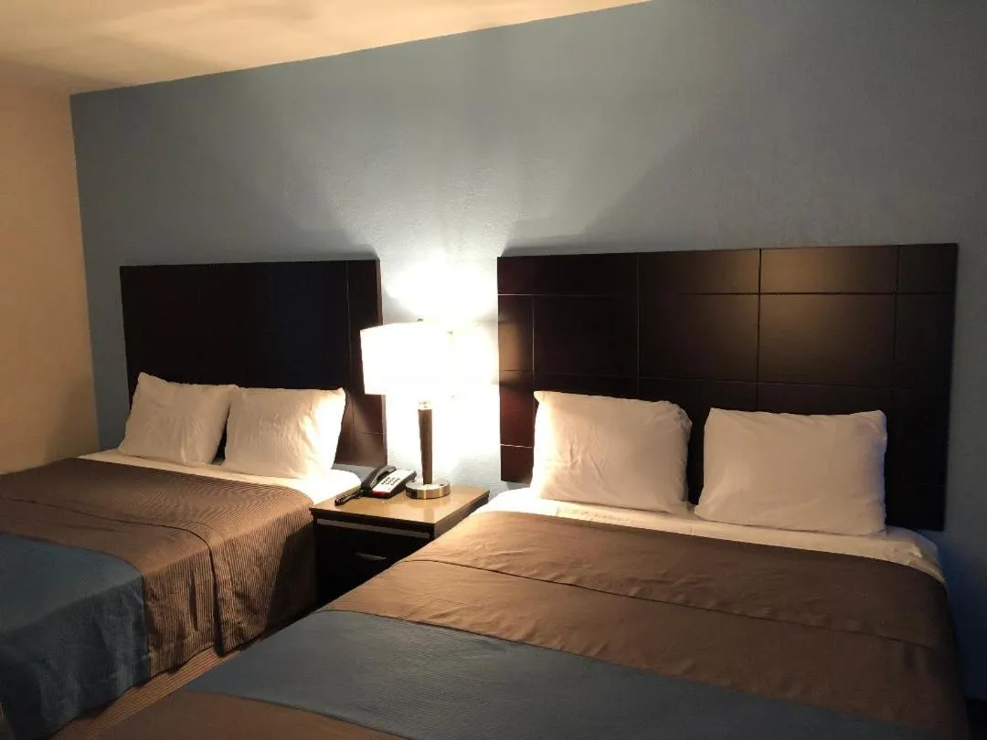 Bed in Inn Of Long Beach