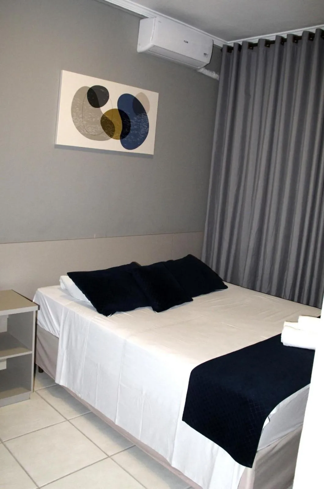 Bed in Italian Palace Hotel Rede Carlton