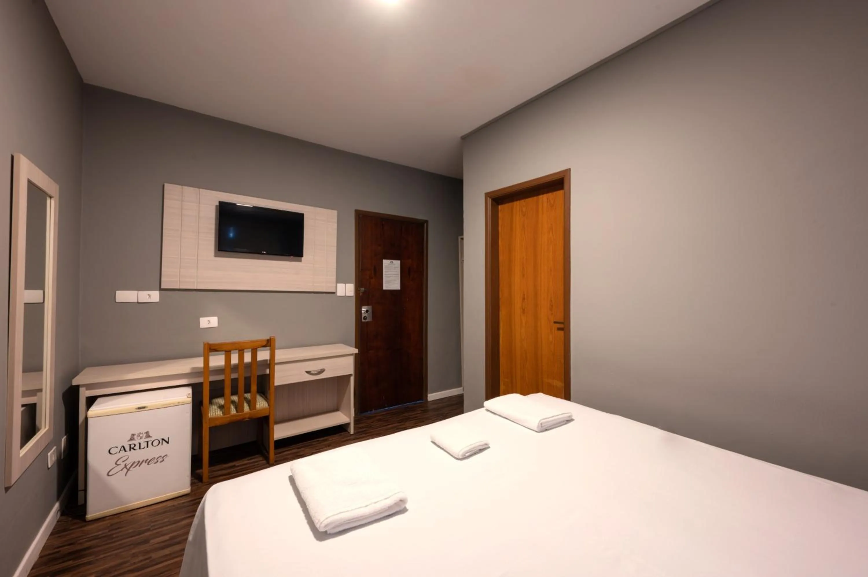 Bed in Italian Palace Hotel Rede Carlton